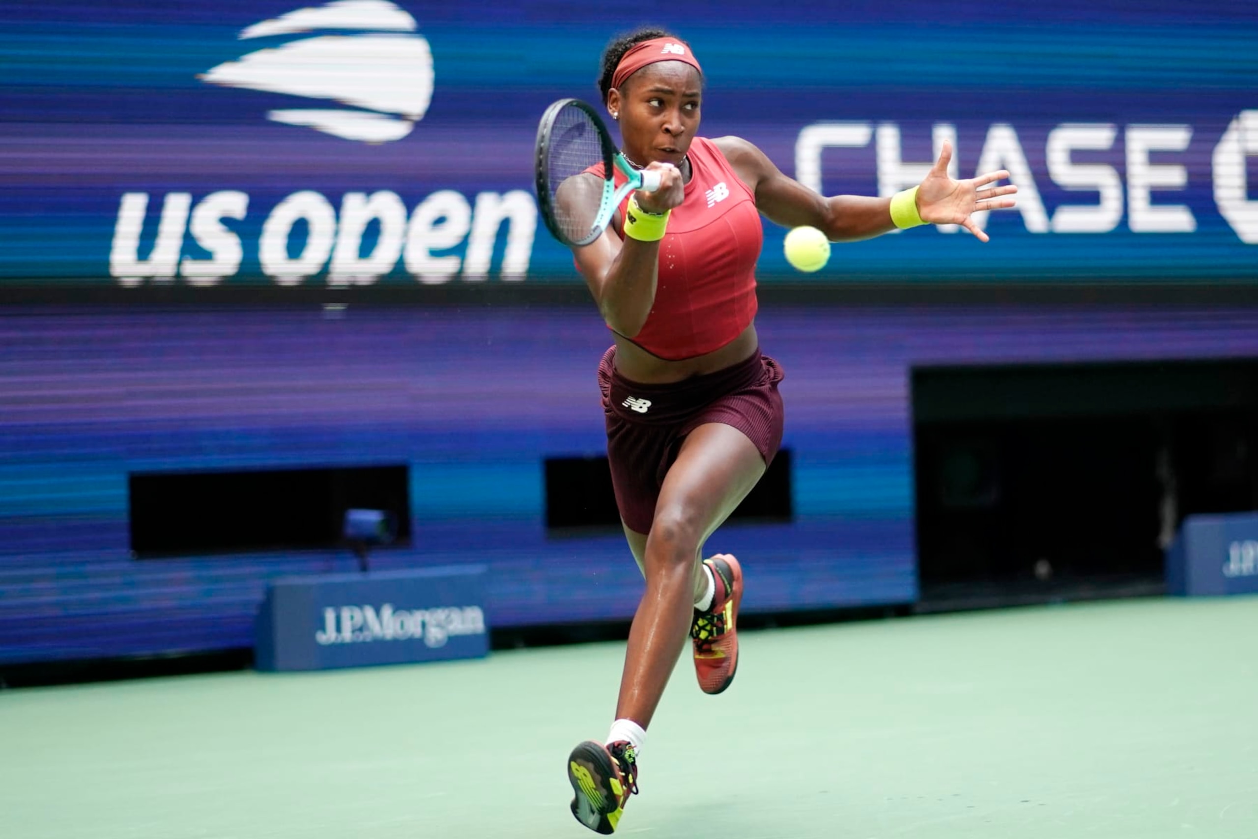 Coco Gauff, of the United States, returns to Caroline Wozniacki, of Denmark, during the fourth round of the U.S. Open tennis championships, Sunday, Sept. 3, 2023, in New York. (AP Photo/Eduardo Munoz Alvarez)