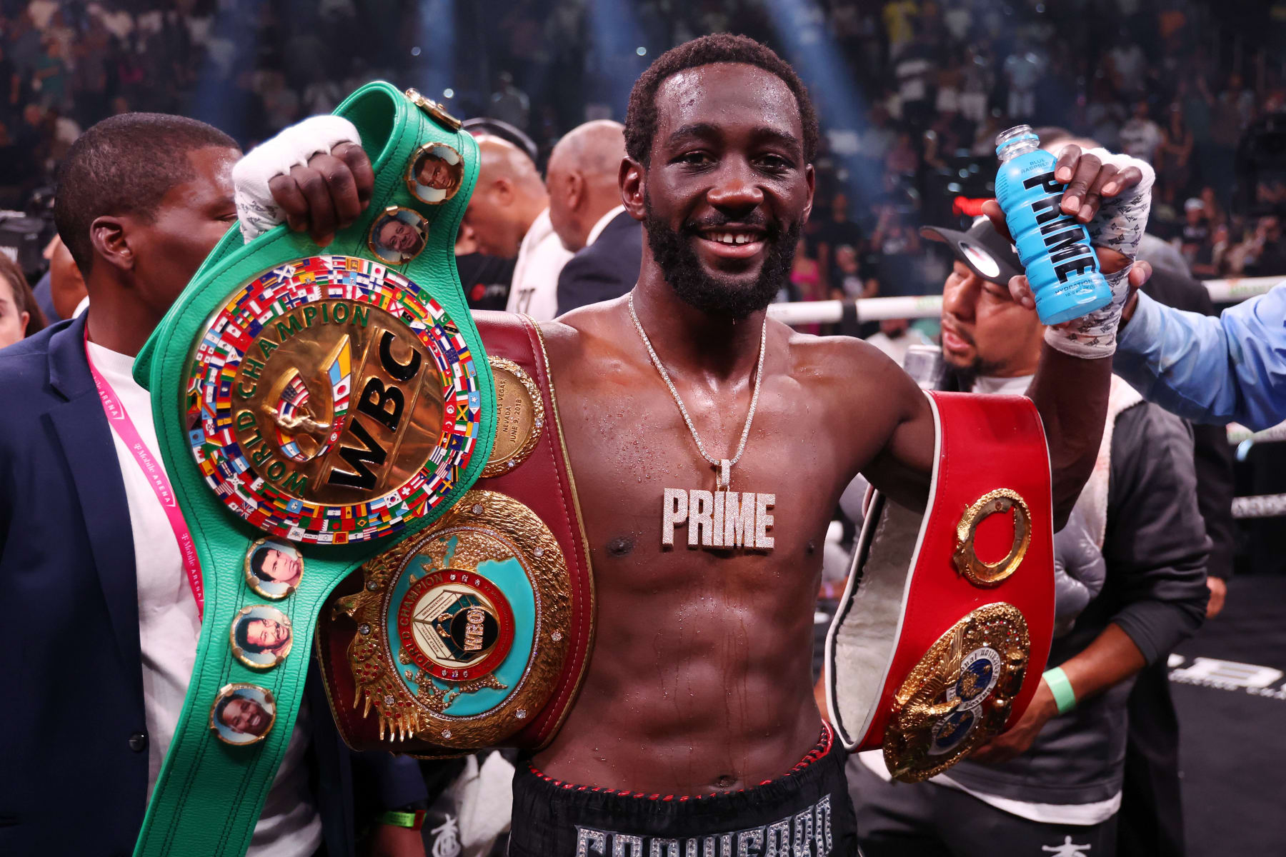 LAS VEGAS, NEVADA - JULY 29: Terence Crawford celebrates with his championship belts after defeating Errol Spence Jr. in the World Welterweight Championship bout at T-Mobile Arena on July 29, 2023 in Las Vegas, Nevada. (Photo by Al Bello/Getty Images)