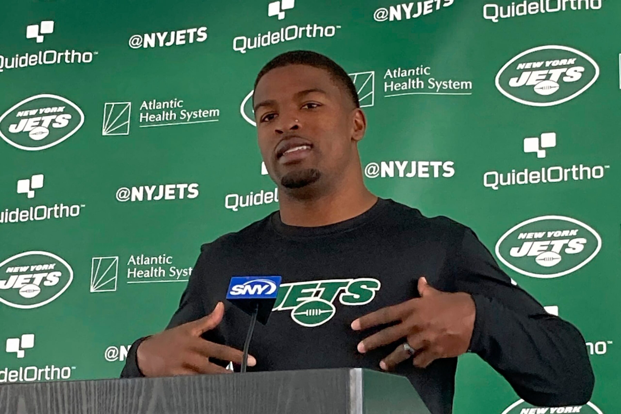 New York Jets cornerback D.J. Reed speaks to reporters at the team's NFL football facility in Florham Park, N.J., Wednesday, July 19, 2023. The Jets report for training camp Wednesday with massive expectations and plenty of cameras watching their every move. (AP Photo/Dennis Waszak Jr.) New York Jets cornerback D.J. Reed speaks to reporters at the team's NFL football facility in Florham Park, N.J., Wednesday, July 19, 2023. The Jets report for training camp Wednesday with massive expectations and plenty of cameras watching their every move. (AP Photo/Dennis Waszak Jr.)
