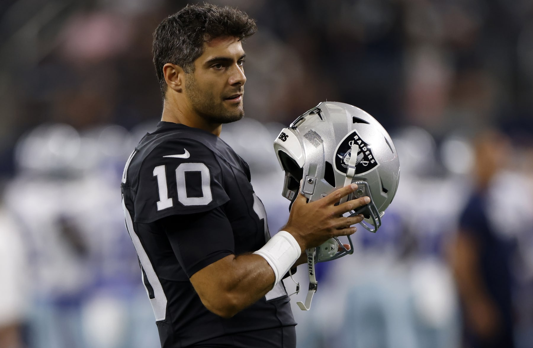 ARLINGTON, TX - AUGUST 26: Jimmy Garoppolo #10 of the Las Vegas Raiders looks on before a preseason game against the Dallas Cowboys at AT&T Stadium on August 26, 2023 in Arlington, Texas. (Photo by Ron Jenkins/Getty Images)