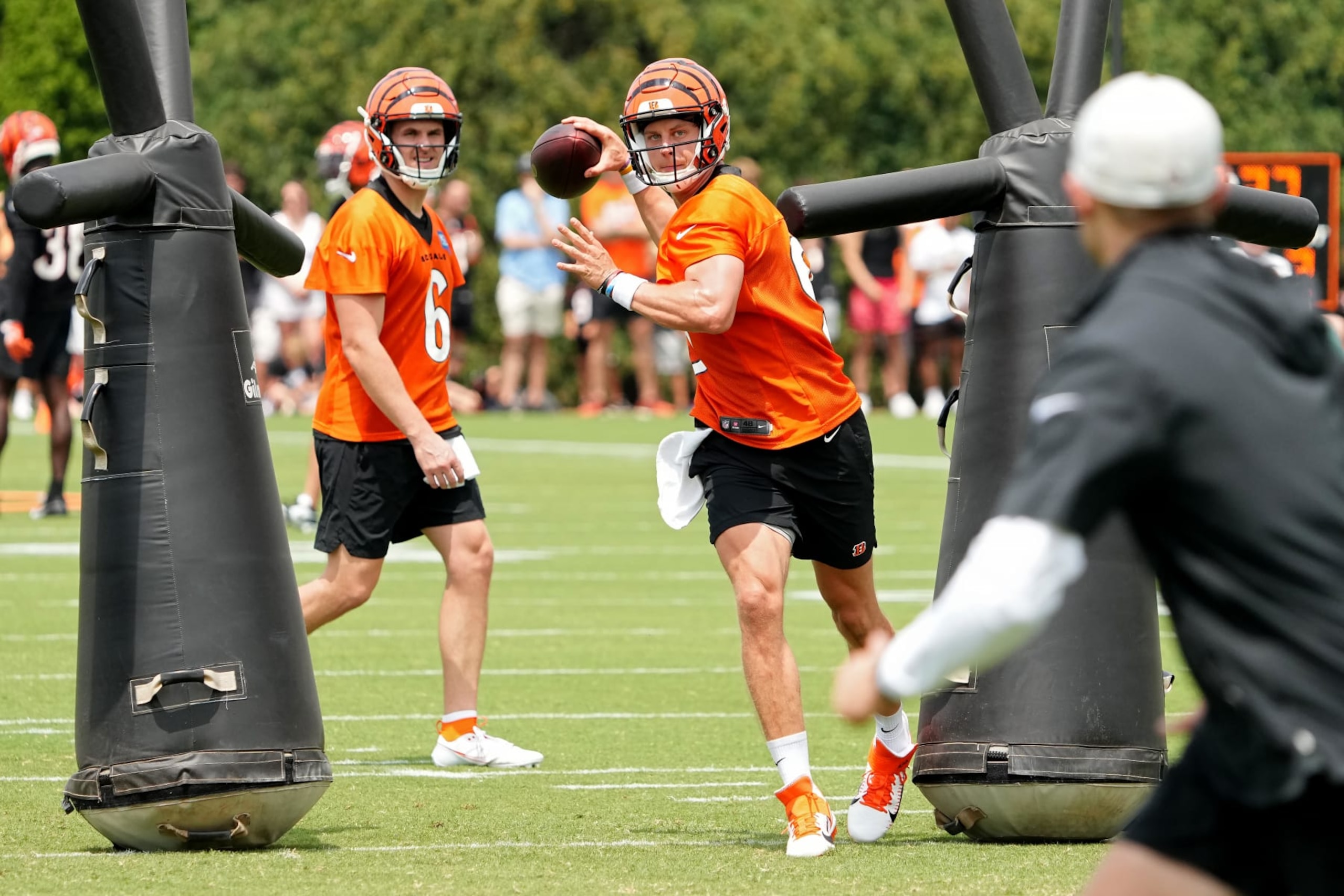 CINCINNATI, OHIO - JULY 26: Joe Burrow #9 of the Cincinnati Bengals participates in a drill during training camp at Kettering Health Practice Fields on July 26, 2023 in Cincinnati, Ohio. (Photo by Dylan Buell/Getty Images)