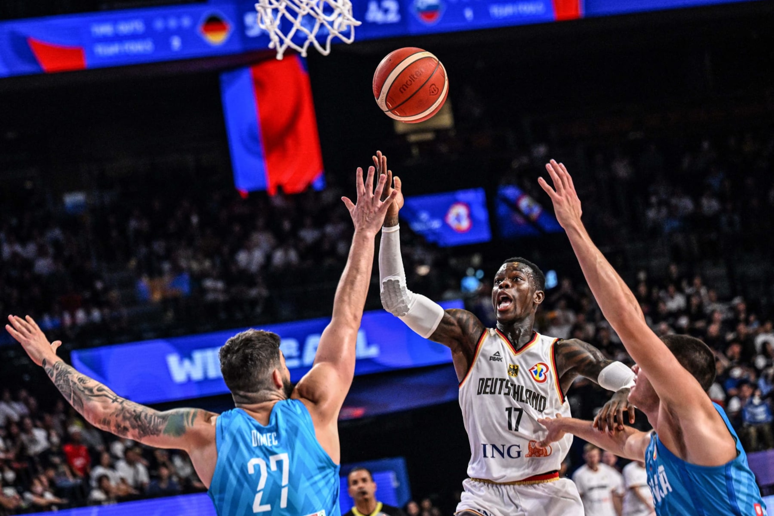 Germany's Dennis Schroder drives to the basket during the FIBA Basketball World Cup group K match between Germany and Slovenia at Okinawa Arena in Okinawa on September 3, 2023. (Photo by Yuichi YAMAZAKI / AFP) (Photo by YUICHI YAMAZAKI/AFP via Getty Images)