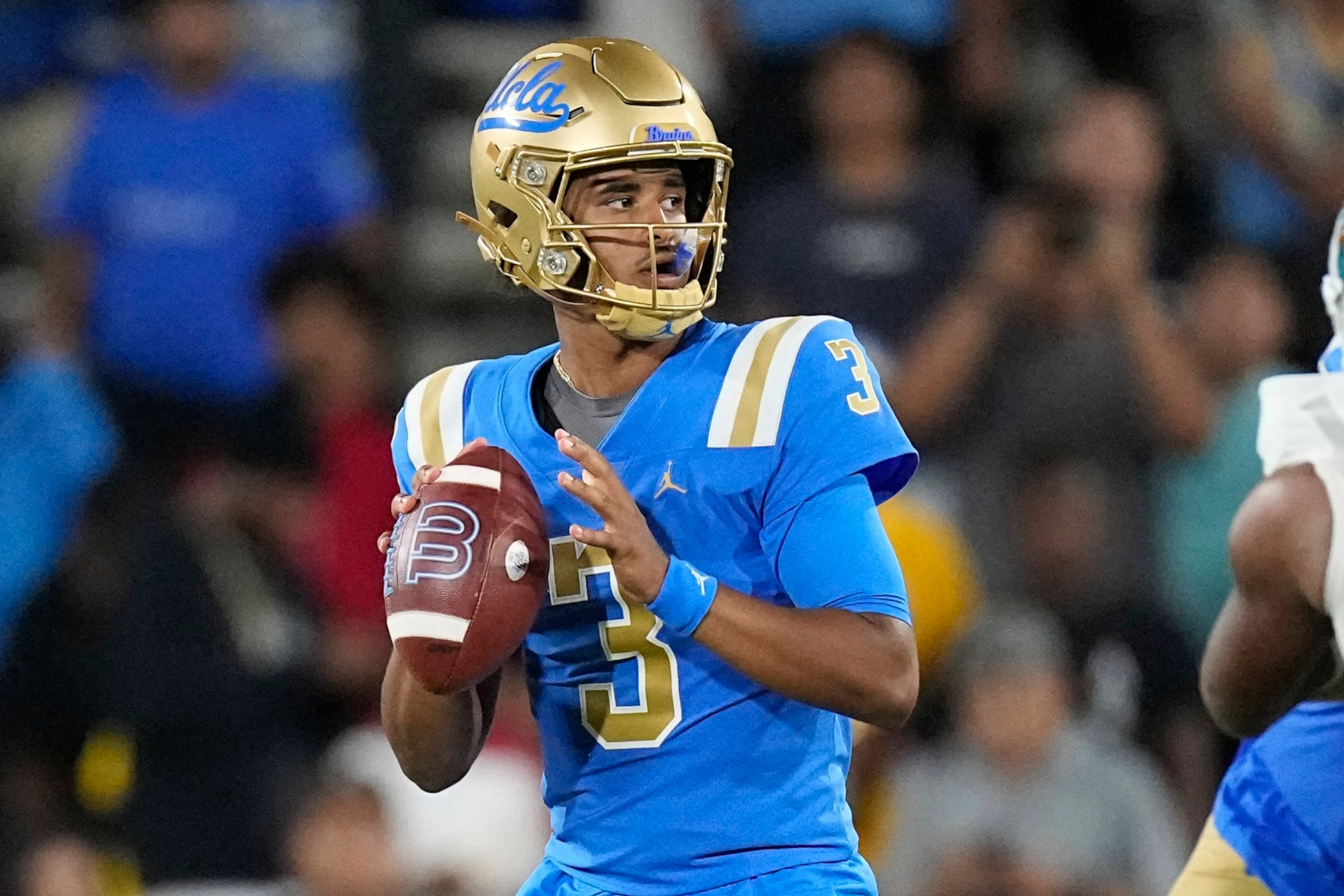 UCLA quarterback Dante Moore gets set to pass during the second half of an NCAA college football game against Coastal Carolina Saturday, Sept. 2, 2023, in Pasadena, Calif. (AP Photo/Mark J. Terrill)