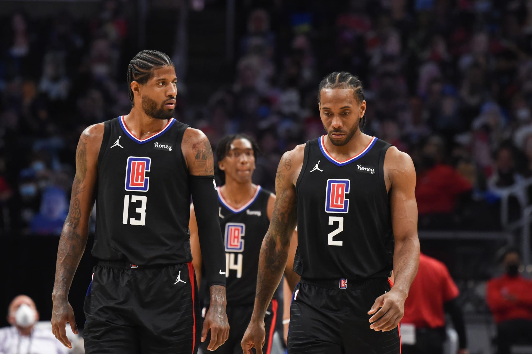 LOS ANGELES, CA - MAY 25: Paul George #13 of the LA Clippers and Kawhi Leonard #2 of the LA Clippers look on during the game against the Dallas Mavericks during Round 1, Game 2 of the 2021 NBA Playoffs on May 25, 2021 at STAPLES Center in Los Angeles, California. NOTE TO USER: User expressly acknowledges and agrees that, by downloading and/or using this Photograph, user is consenting to the terms and conditions of the Getty Images License Agreement. Mandatory Copyright Notice: Copyright 2021 NBAE (Photo by Juan Ocampo/NBAE via Getty Images)