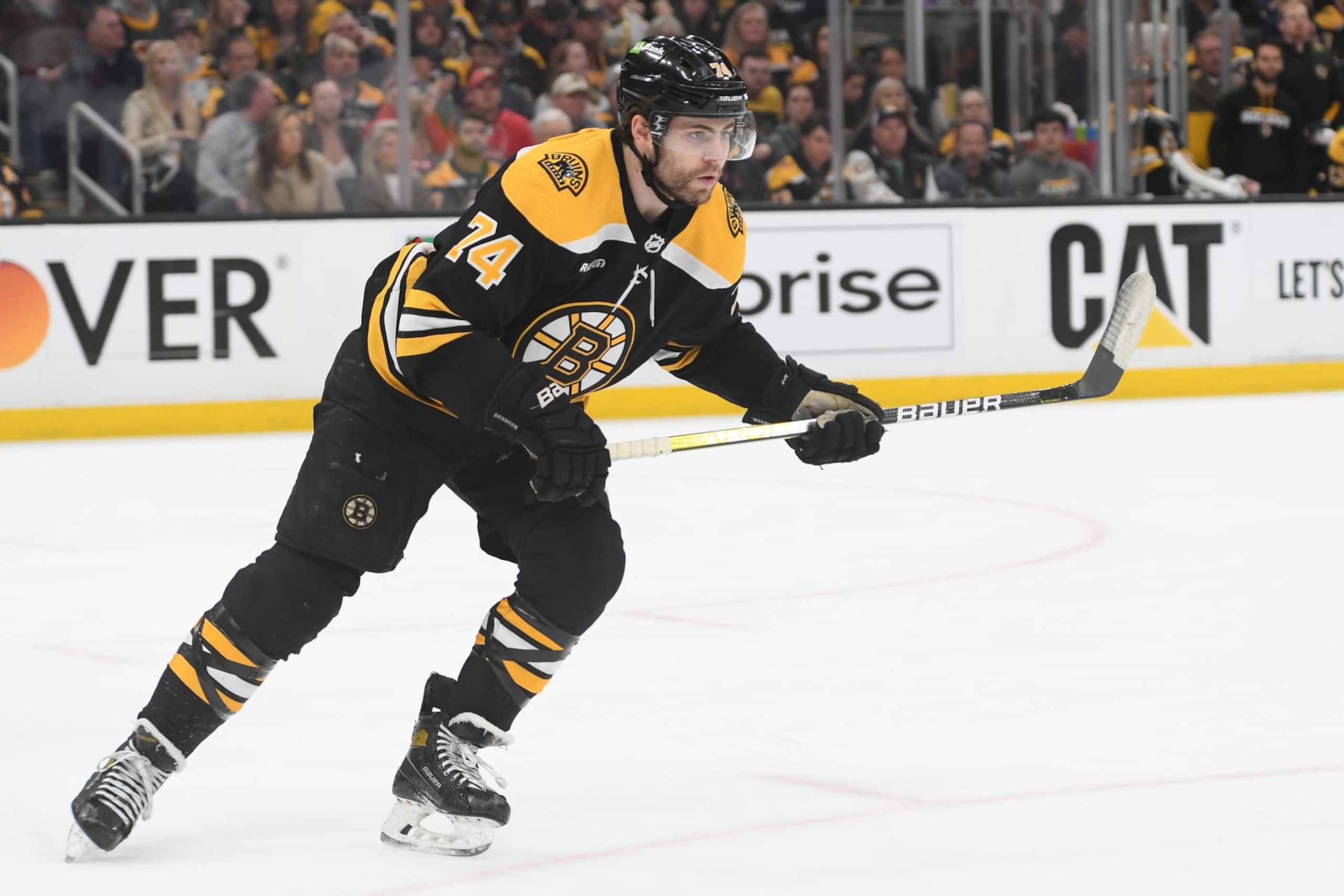 BOSTON, MASSACHUSETTS APRIL 26: Jake DeBrusk #74 of the Boston Bruins skates against the Florida Panthers in Game Five of the First Round of the 2023 Stanley Cup Playoffs at TD Garden on April 26, 2023, in Boston, Massachusetts. (Photo by Steve Babineau/NHLI via Getty Images) BOSTON, MASSACHUSETTS APRIL 26: Jake DeBrusk #74 of the Boston Bruins skates against the Florida Panthers in Game Five of the First Round of the 2023 Stanley Cup Playoffs at TD Garden on April 26, 2023, in Boston, Massachusetts. (Photo by Steve Babineau/NHLI via Getty Images)