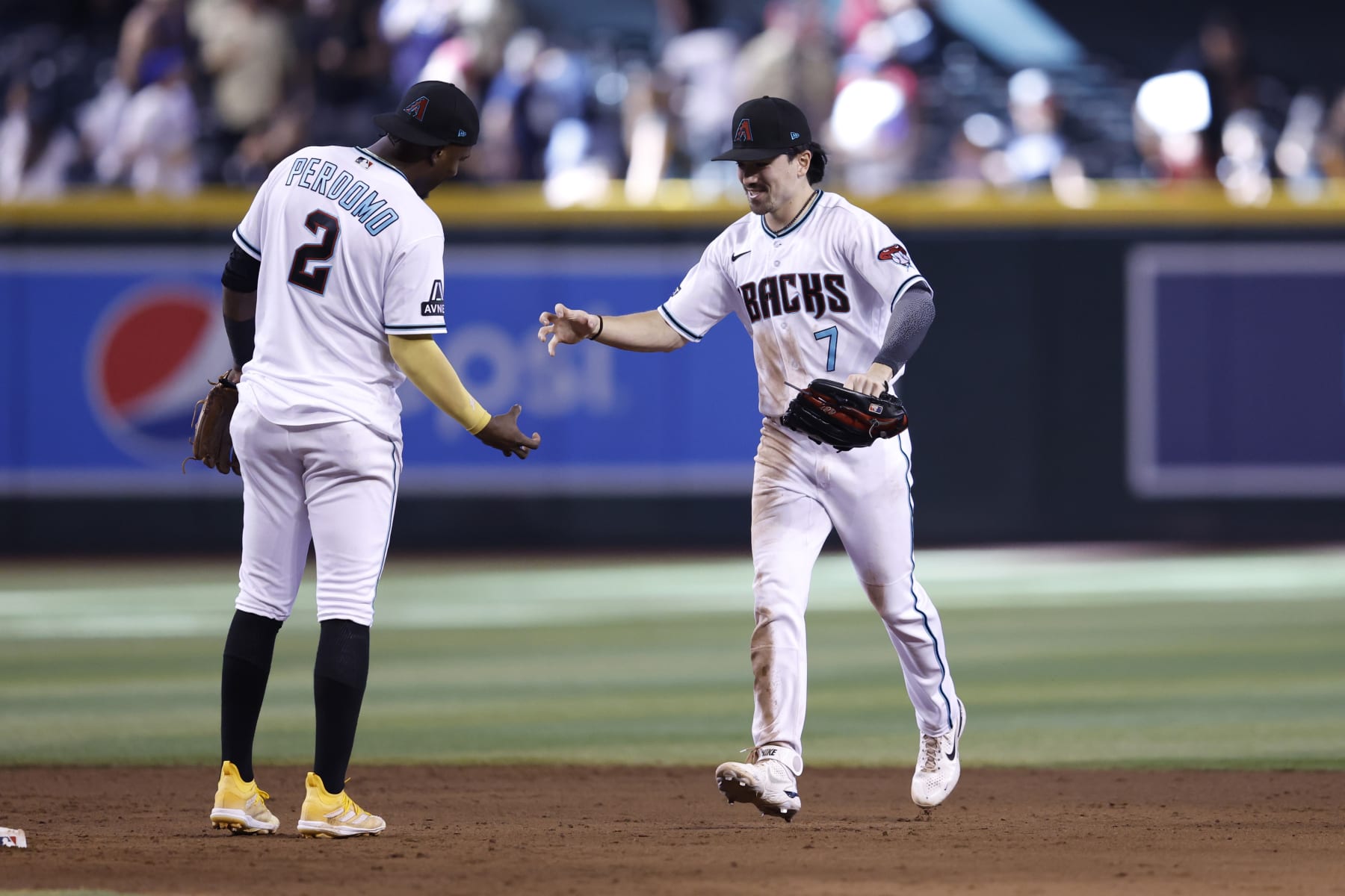 Geraldo Perdomo (L) and Corbin Carroll (R)