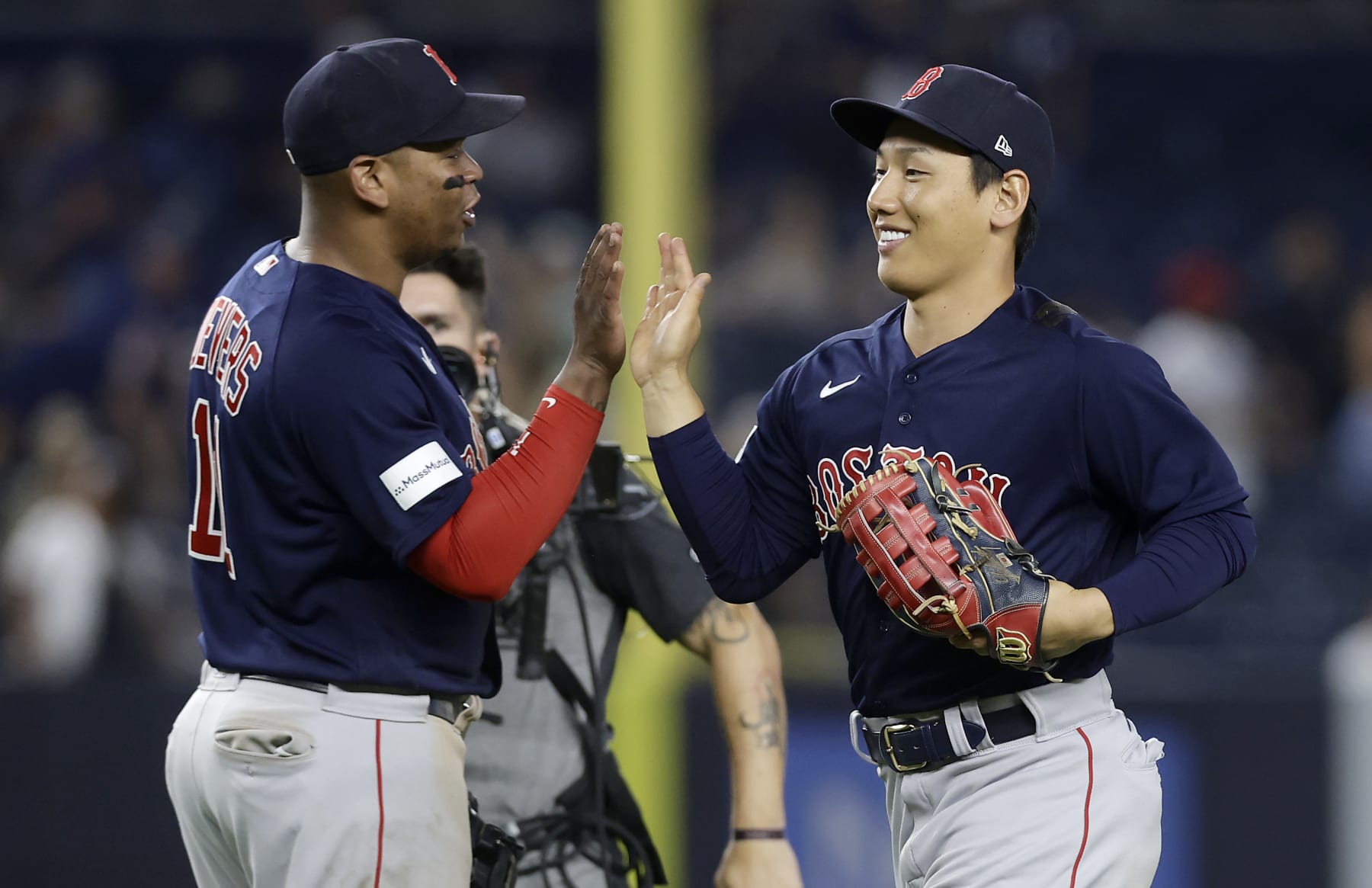 Rafael Devers (L) and Masataka Yoshida (R)