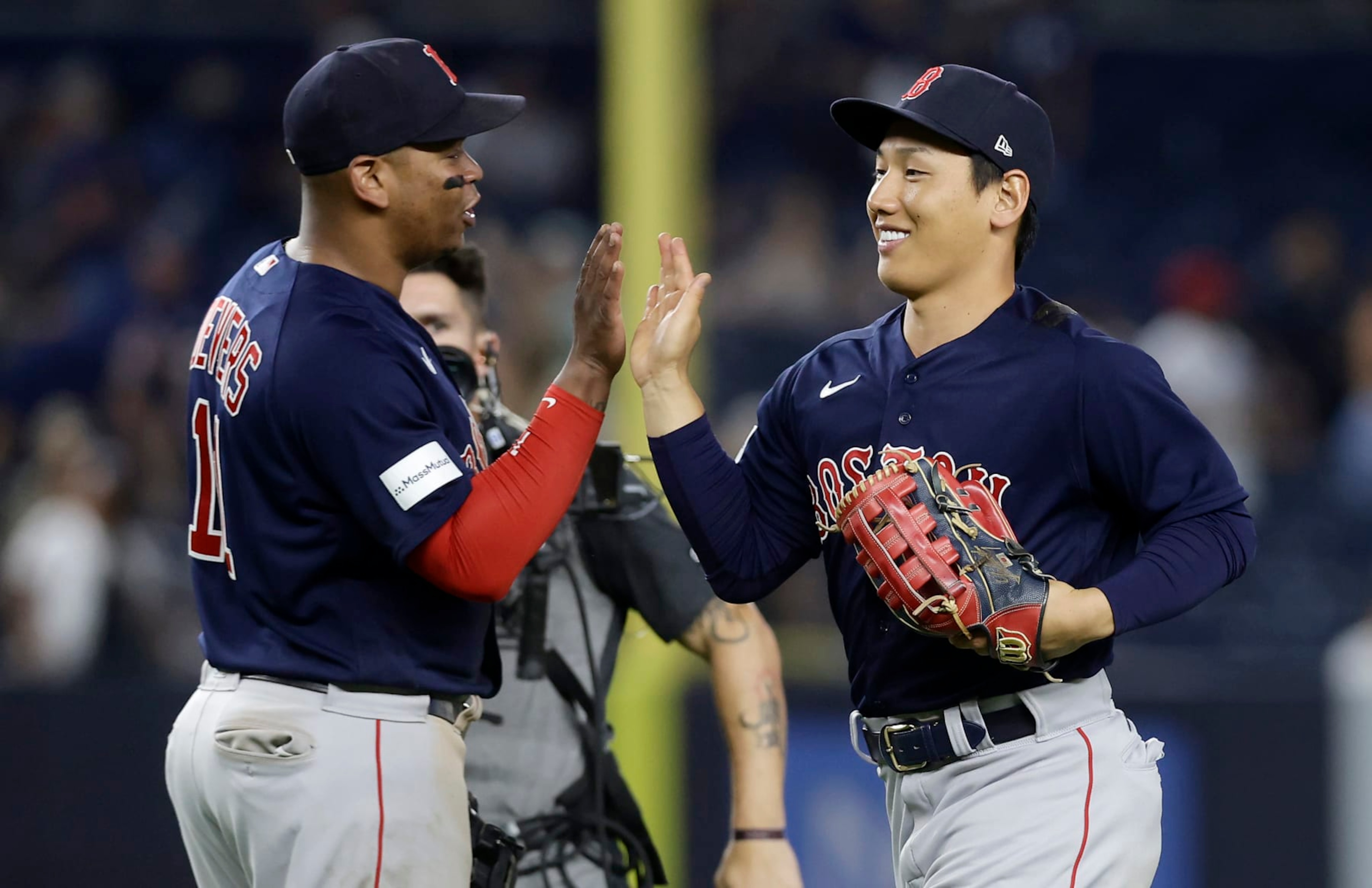 Rafael Devers (L) and Masataka Yoshida (R)