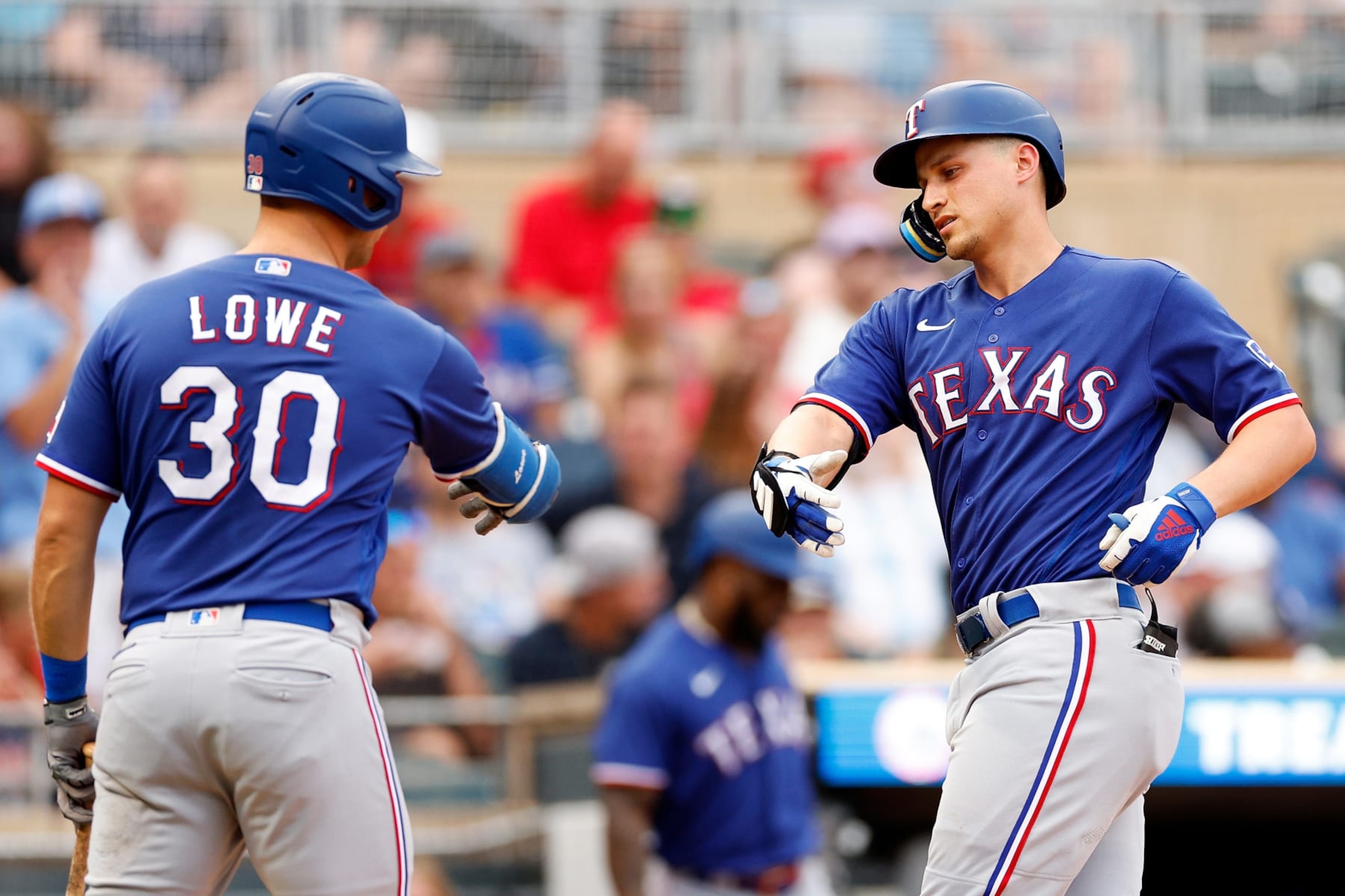 Nathaniel Lowe (L) and Corey Seager (R) Nathaniel Lowe (L) and Corey Seager (R)