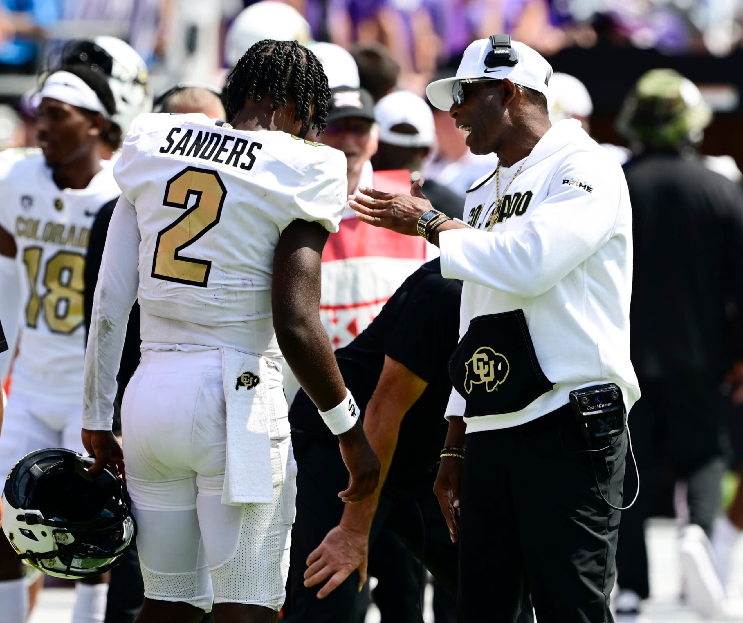FT. WORTH, TX - SEPTEMBER 02: Colorado Buffaloes head coach Deion Sanders talks with his son, starting QB Shedeur Sanders (2) along the sidelines in the fourth quarter at Amon G. Carter Stadium in Ft. Worth September 02, 2023. (Photo by Andy Cross/MediaNews Group/The Denver Post via Getty Images)