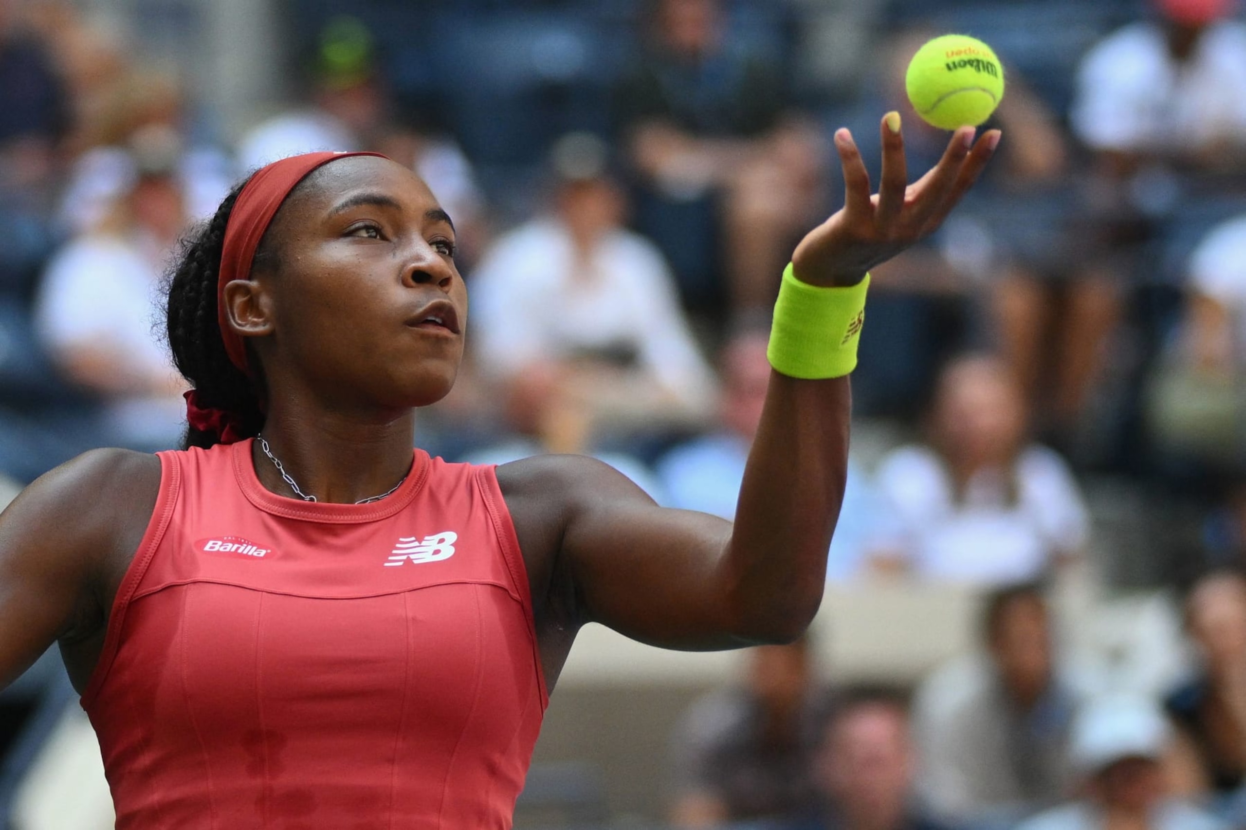 USA's Coco Gauff serves to Latvia's Jelena Ostapenko during the US Open tennis tournament women's singles quarter-finals match at the USTA Billie Jean King National Tennis Center in New York City, on September 5, 2023. (Photo by ANGELA WEISS / AFP) (Photo by ANGELA WEISS/AFP via Getty Images)