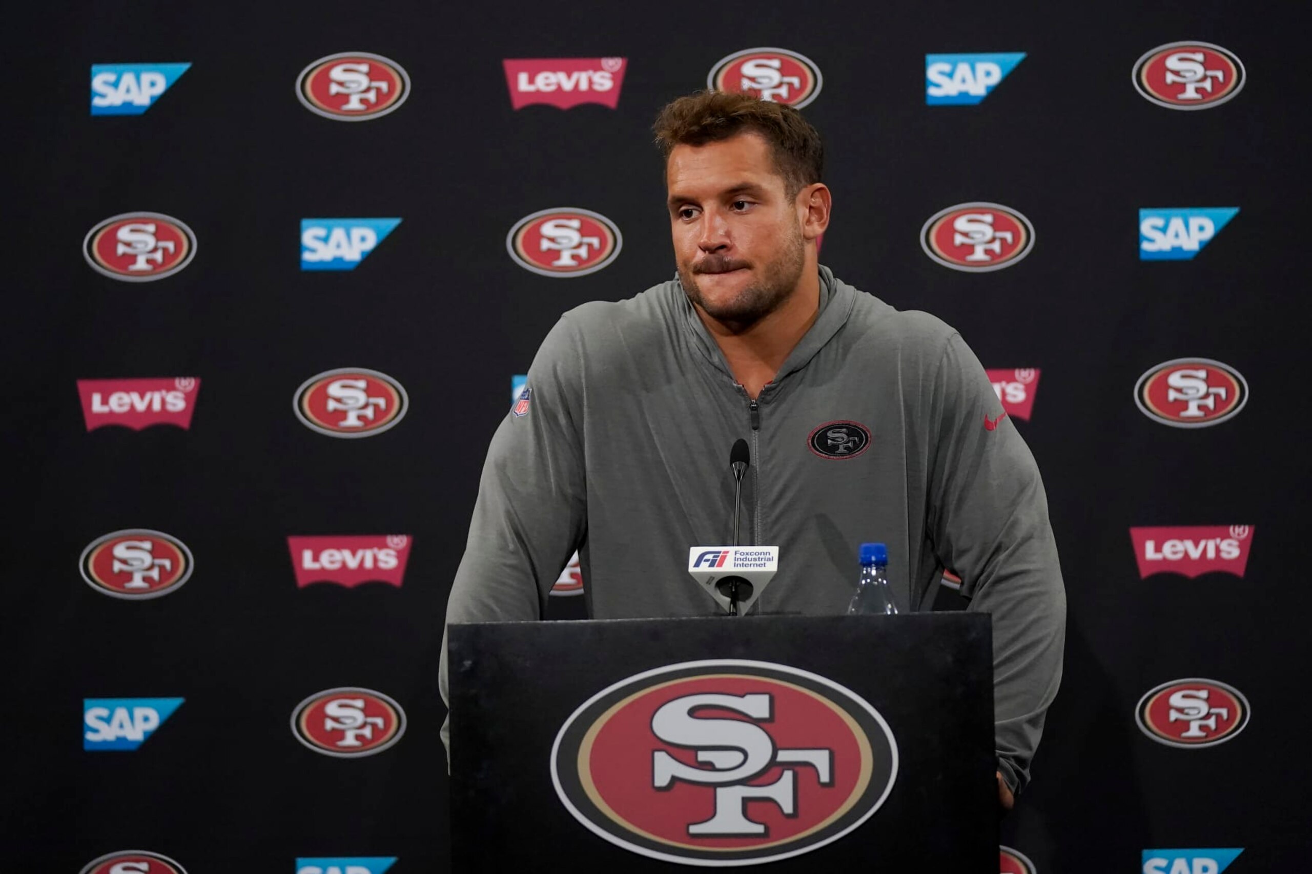 San Francisco 49ers' Nick Bosa speaks to reporters after an NFL football practice in Santa Clara, Calif., Tuesday, June 6, 2023. (AP Photo/Jeff Chiu)