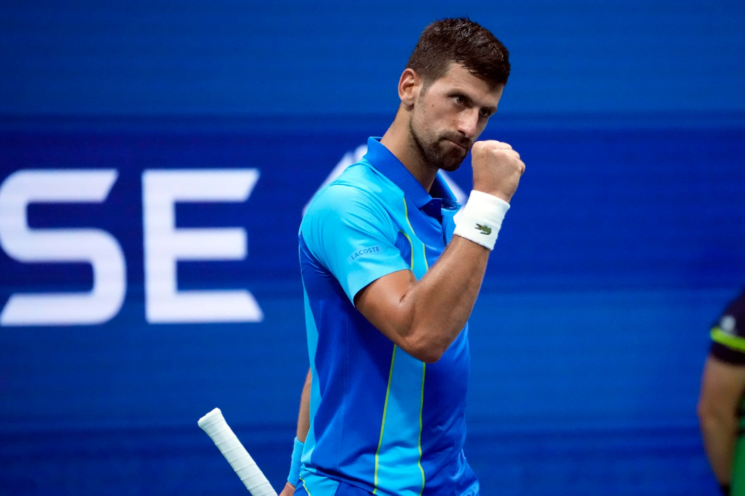 Novak Djokovic, of Serbia, celebrates as he plays Borna Gojo, of Croatia, during the fourth round of the U.S. Open tennis championships, Sunday, Sept. 3, 2023, in New York. (AP Photo/John Minchillo)