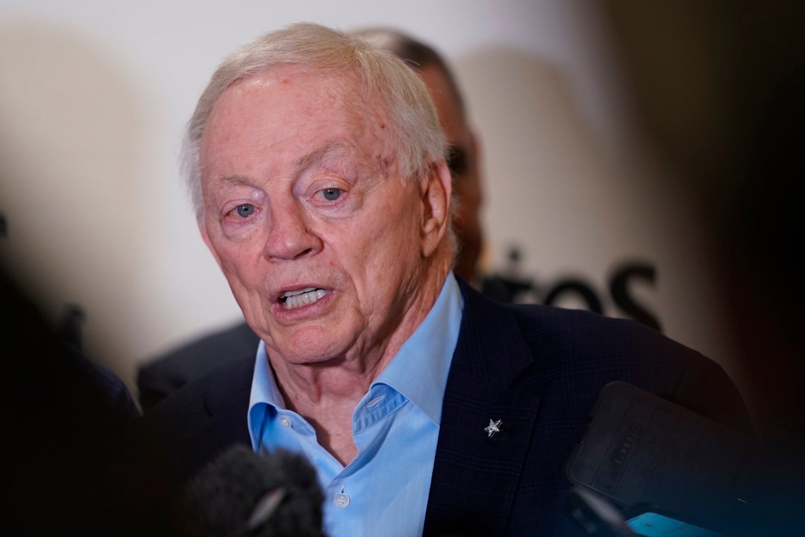 Dallas Cowboys team owner Jerry Jones responds to questions about the team's acquisition of quarterback Trey Lance during a news conference before a preseason NFL football game against the Las Vegas Raiders in Arlington, Texas, Saturday, Aug. 26, 2023. (AP Photo/Sam Hodde)