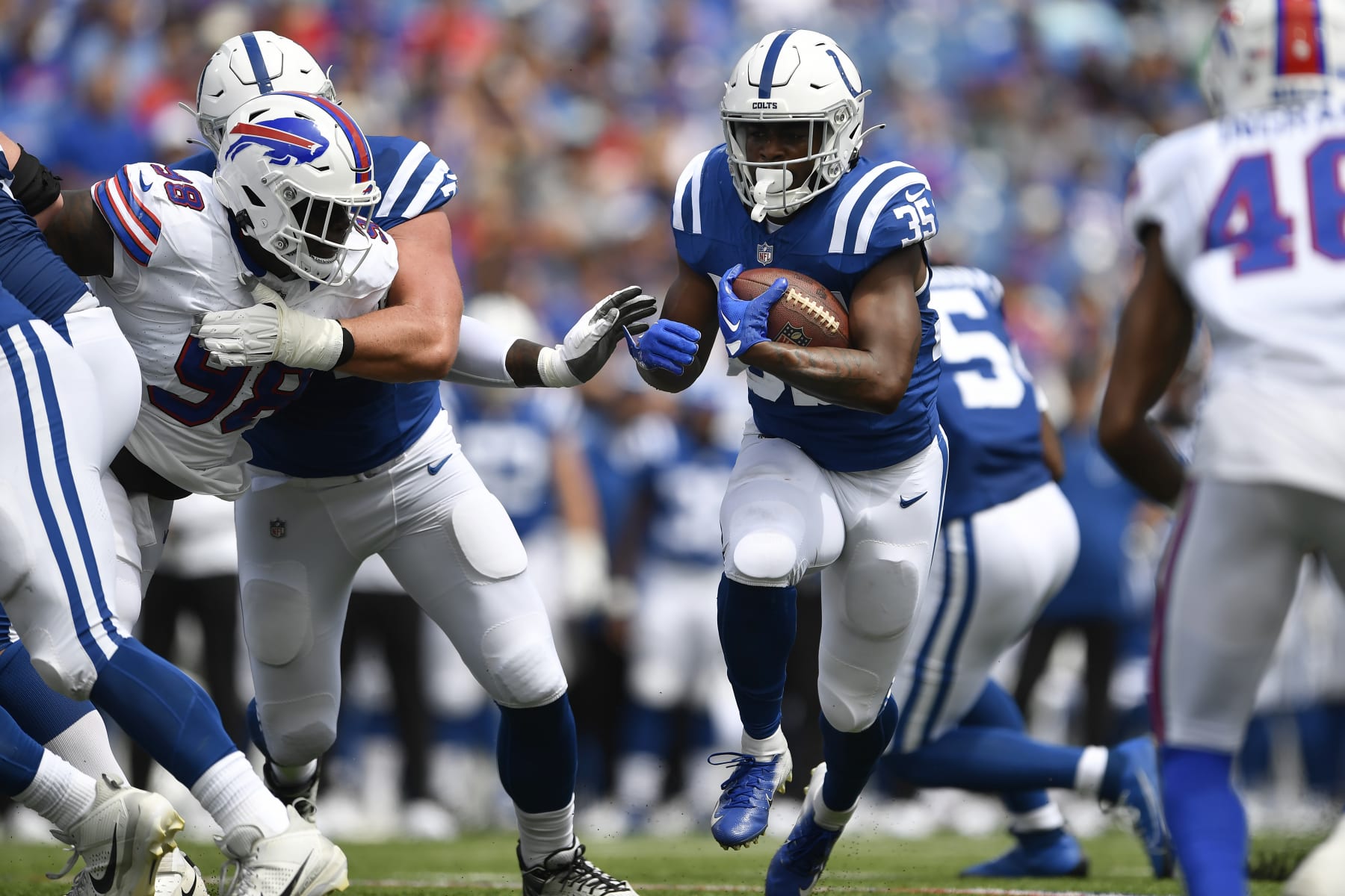 Indianapolis Colts running back Deon Jackson (35) runs against the Buffalo Bills during the first half of an NFL preseason football game in Orchard Park, N.Y., Saturday, Aug. 12, 2023. (AP Photo/Adrian Kraus)