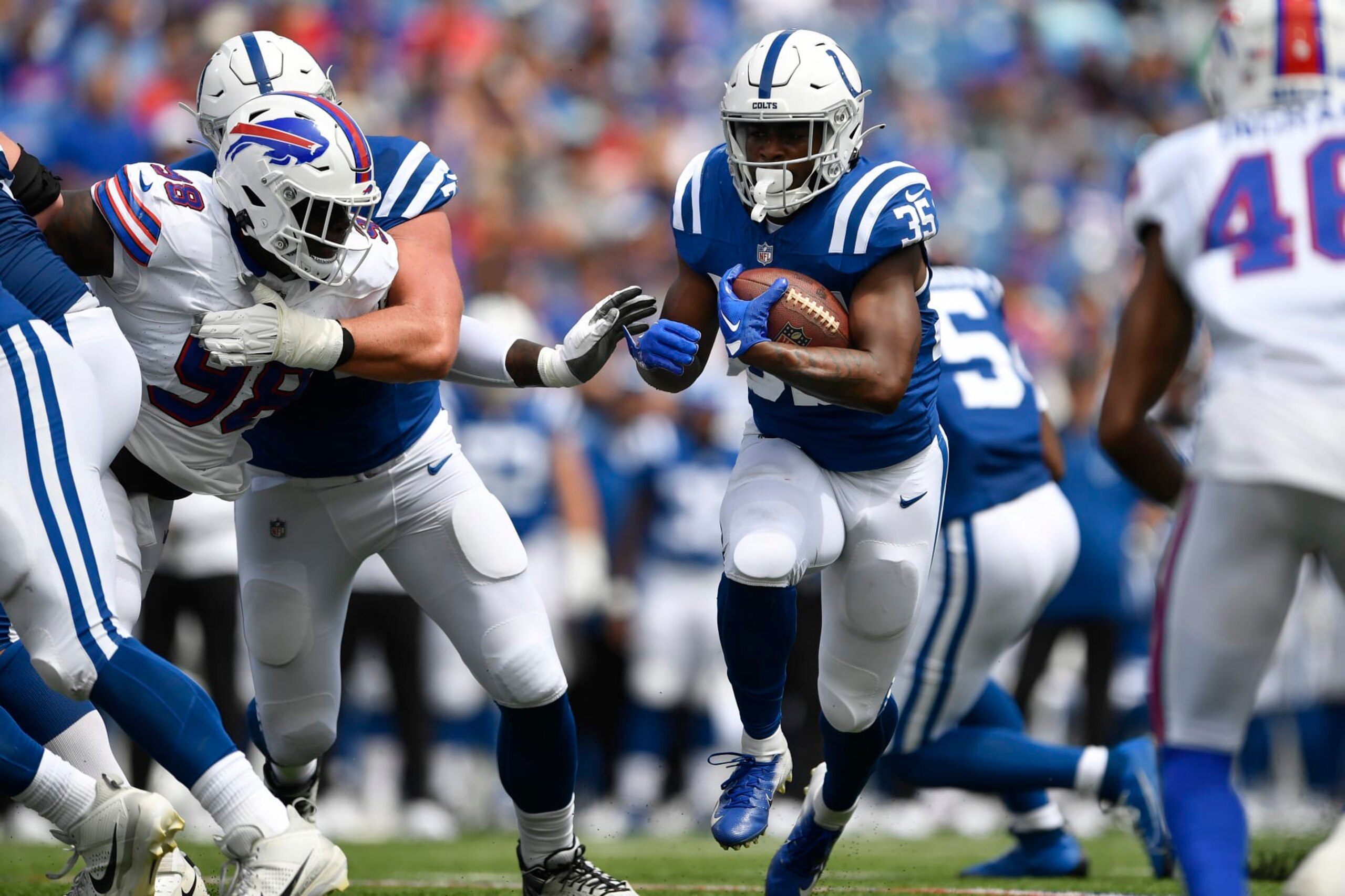 Indianapolis Colts running back Deon Jackson (35) runs against the Buffalo Bills during the first half of an NFL preseason football game in Orchard Park, N.Y., Saturday, Aug. 12, 2023. (AP Photo/Adrian Kraus)
