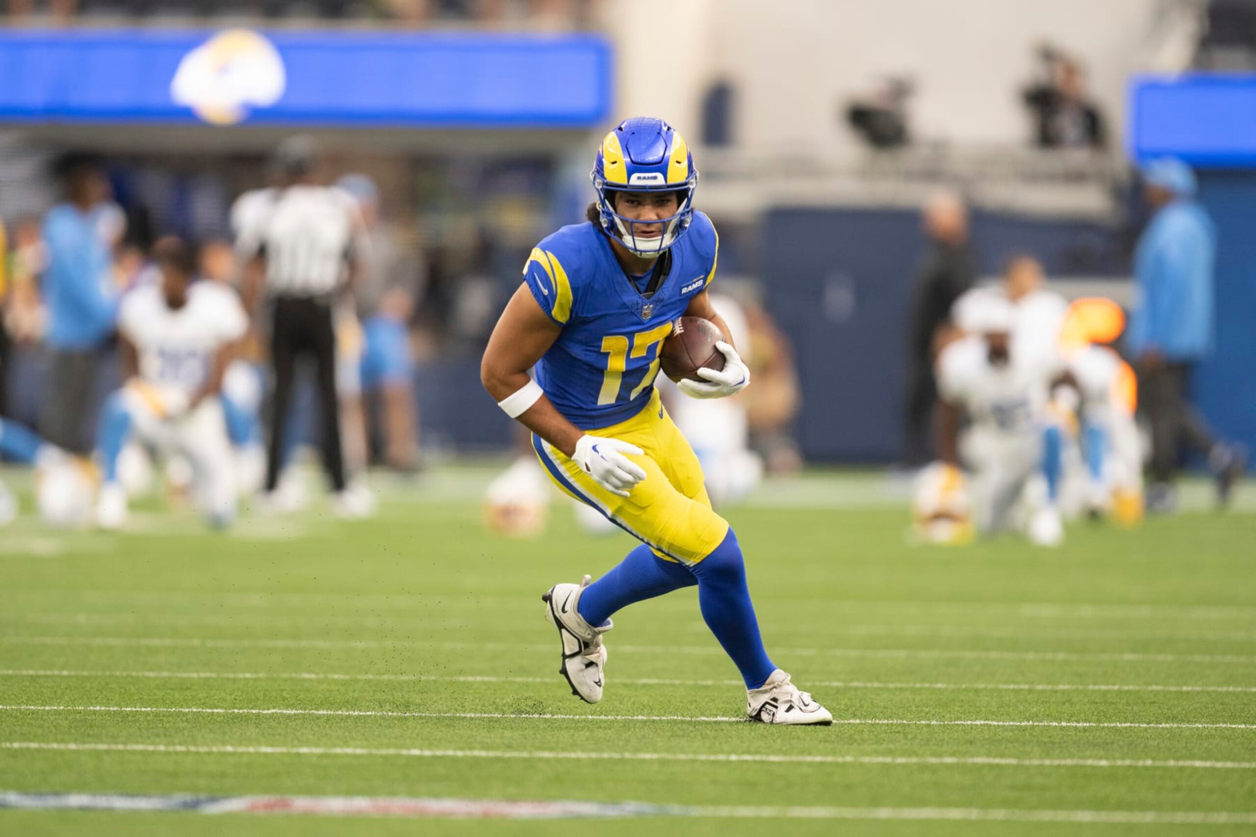 Los Angeles Rams wide receiver Puka Nacua (17) runs with the ball before an NFL preseason football game ast the Los Angeles Chargers, Saturday, Aug. 12, 2023, in Inglewood, Calif. (AP Photo/Kyusung Gong)