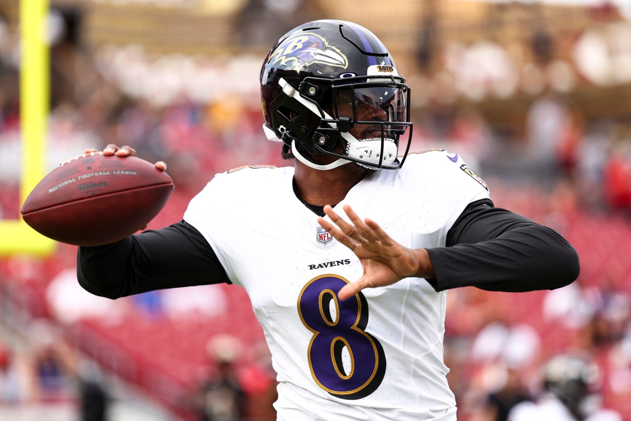 TAMPA, FL - AUGUST 26: Lamar Jackson #8 of the Baltimore Ravens warms up prior to an NFL preseason football game against the Tampa Bay Buccaneers at Raymond James Stadium on August 26, 2023 in Tampa, Florida. (Photo by Kevin Sabitus/Getty Images)