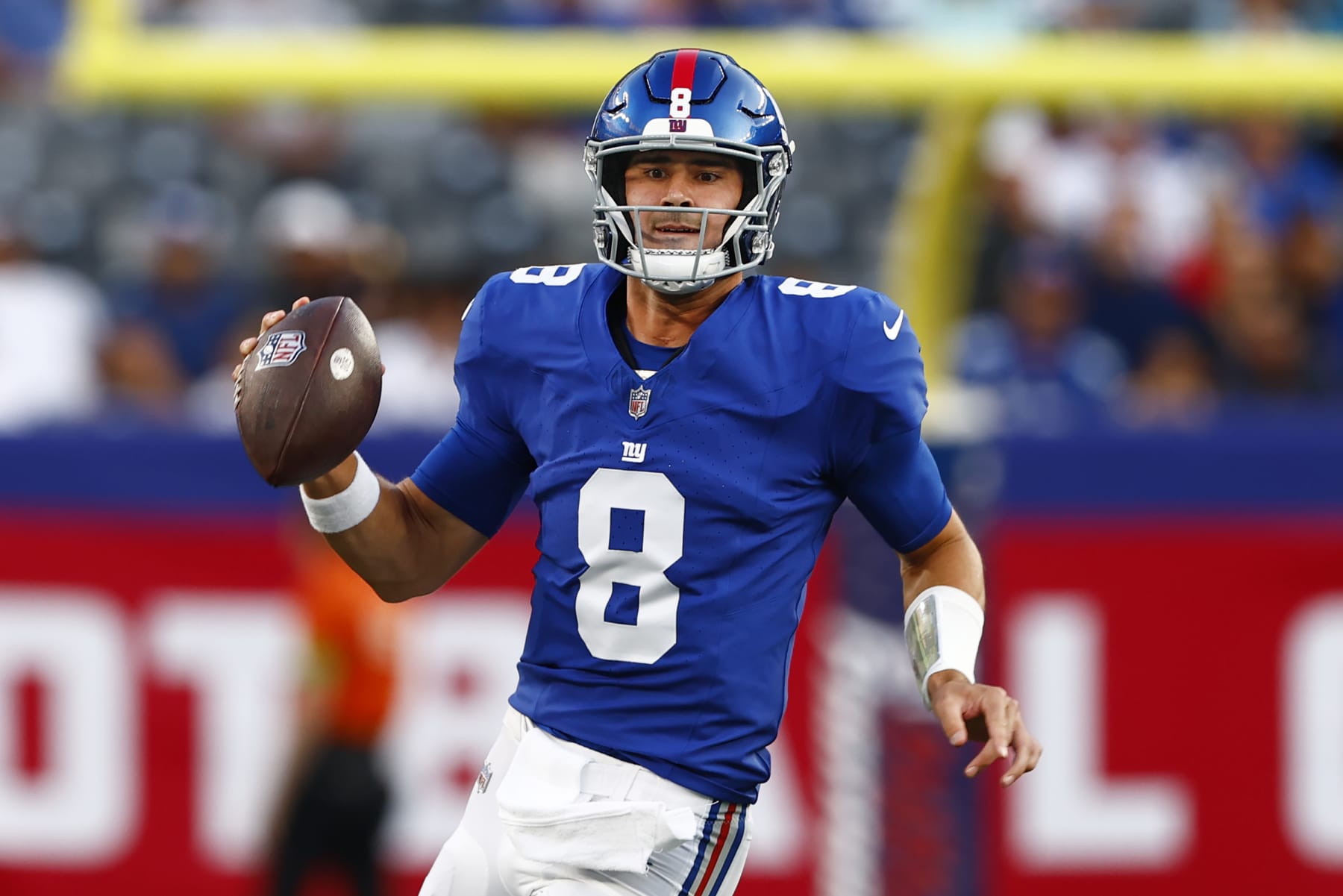 EAST RUTHERFORD, NEW JERSEY - AUGUST 18: Daniel Jones #8 of the New York Giants looks to pass against the Carolina Panthers during the first half of a pre-season football game at MetLife Stadium on August 18, 2023 in East Rutherford, New Jersey. (Photo by Rich Schultz/Getty Images)