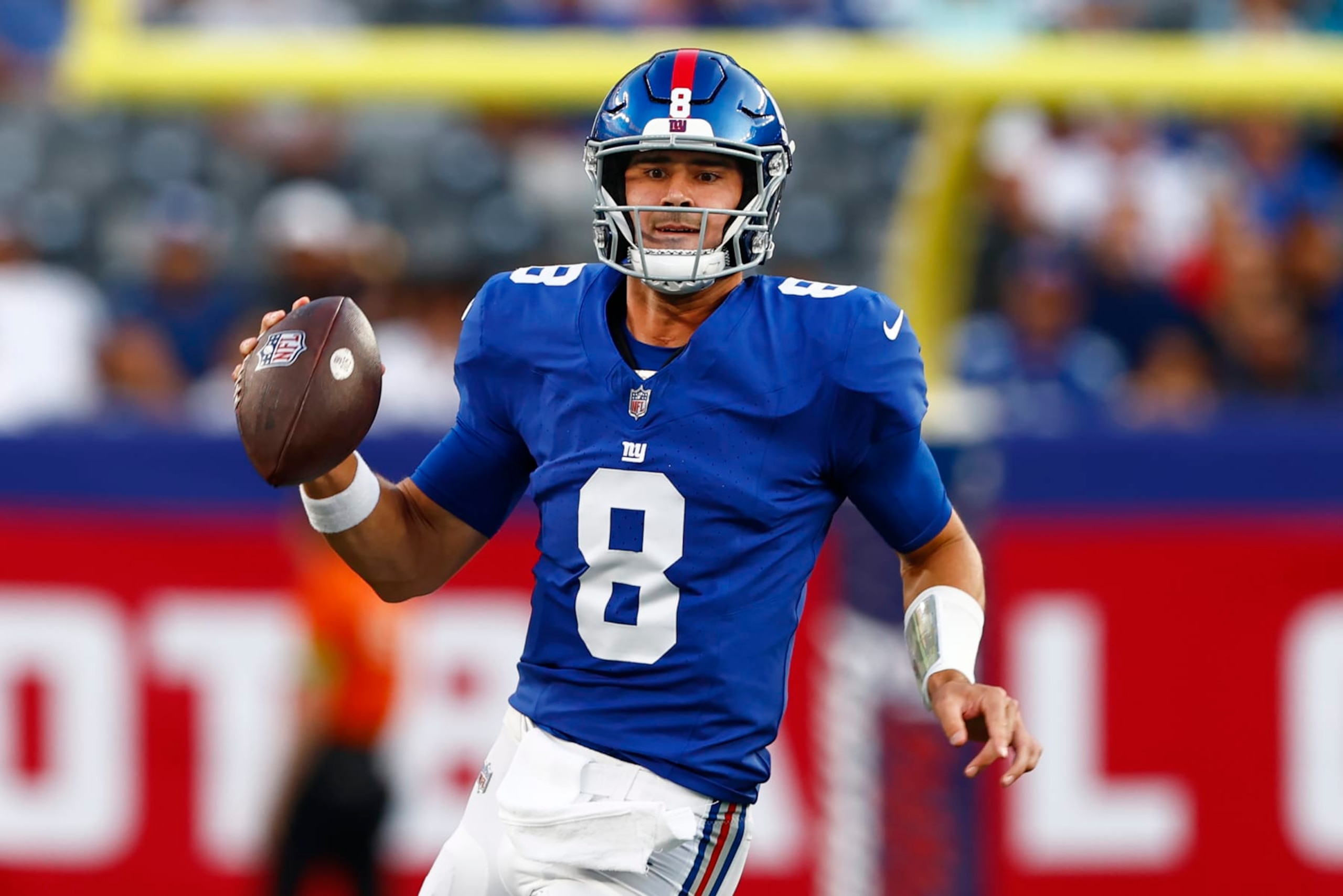 EAST RUTHERFORD, NEW JERSEY - AUGUST 18: Daniel Jones #8 of the New York Giants looks to pass against the Carolina Panthers during the first half of a pre-season football game at MetLife Stadium on August 18, 2023 in East Rutherford, New Jersey. (Photo by Rich Schultz/Getty Images)