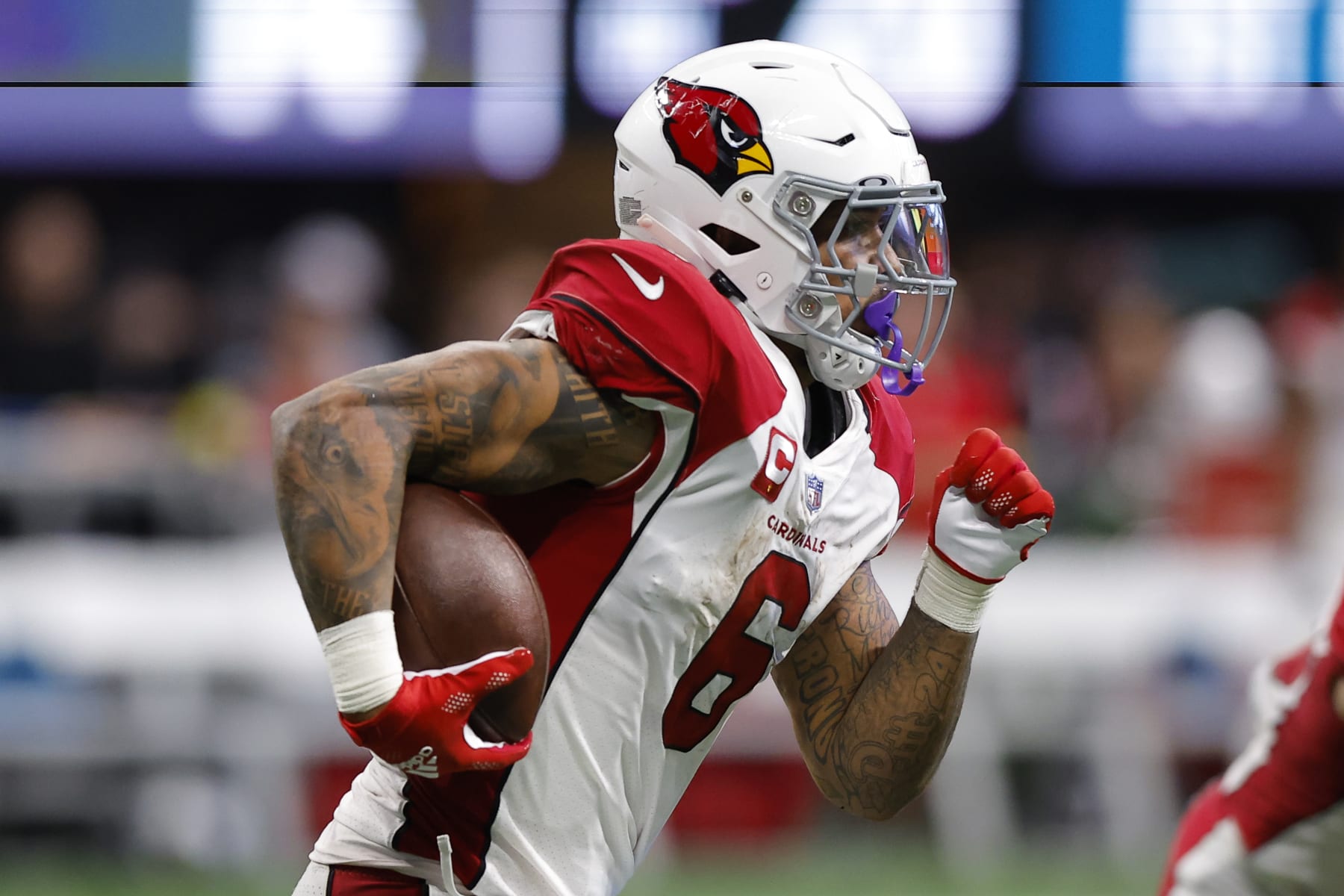 ATLANTA, GA - JANUARY 01: James Conner #6 of the Arizona Cardinals rushes during the first half against the Atlanta Falcons at Mercedes-Benz Stadium on January 1, 2023 in Atlanta, Georgia. (Photo by Todd Kirkland/Getty Images)