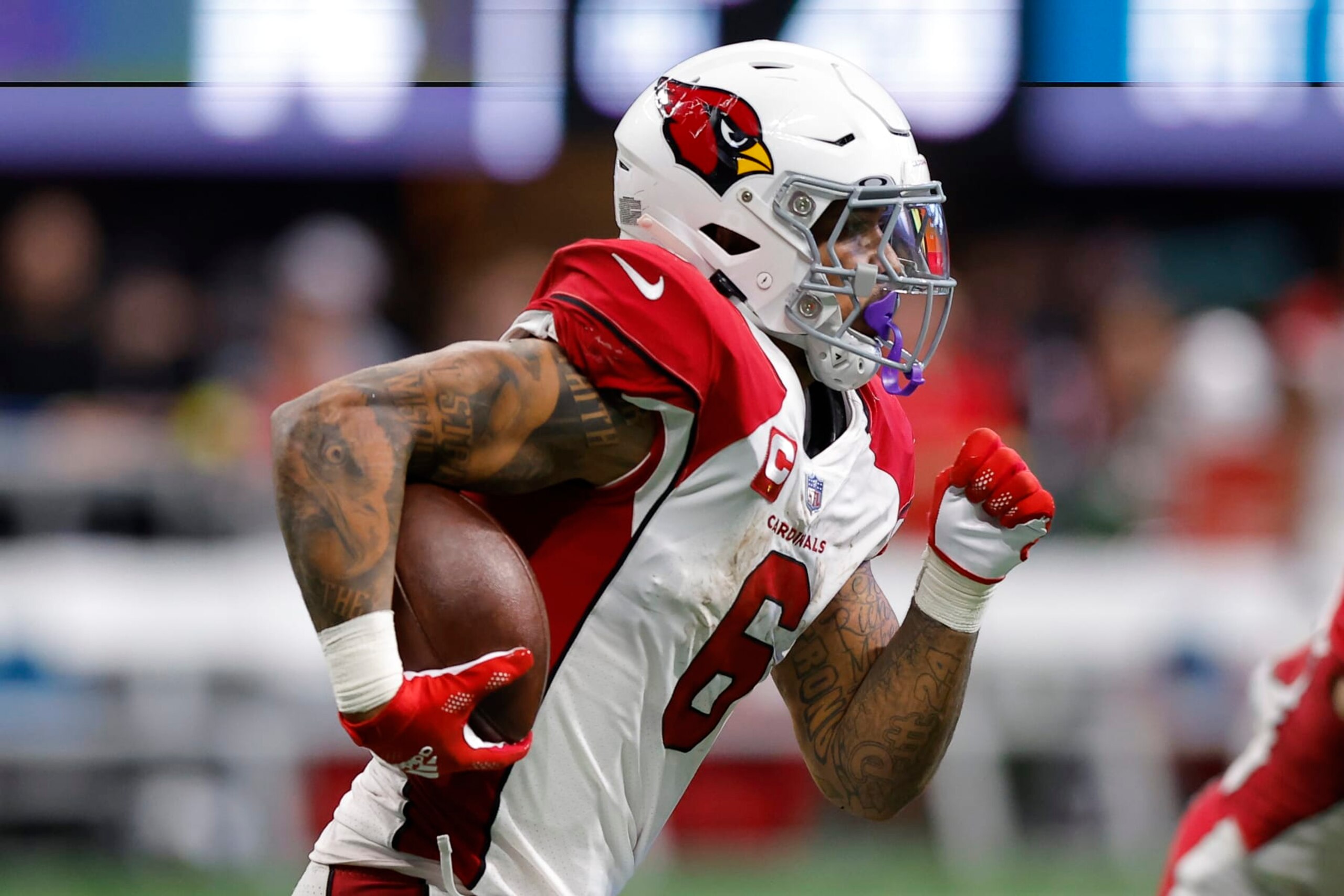 ATLANTA, GA - JANUARY 01: James Conner #6 of the Arizona Cardinals rushes during the first half against the Atlanta Falcons at Mercedes-Benz Stadium on January 1, 2023 in Atlanta, Georgia. (Photo by Todd Kirkland/Getty Images) ATLANTA, GA - JANUARY 01: James Conner #6 of the Arizona Cardinals rushes during the first half against the Atlanta Falcons at Mercedes-Benz Stadium on January 1, 2023 in Atlanta, Georgia. (Photo by Todd Kirkland/Getty Images)