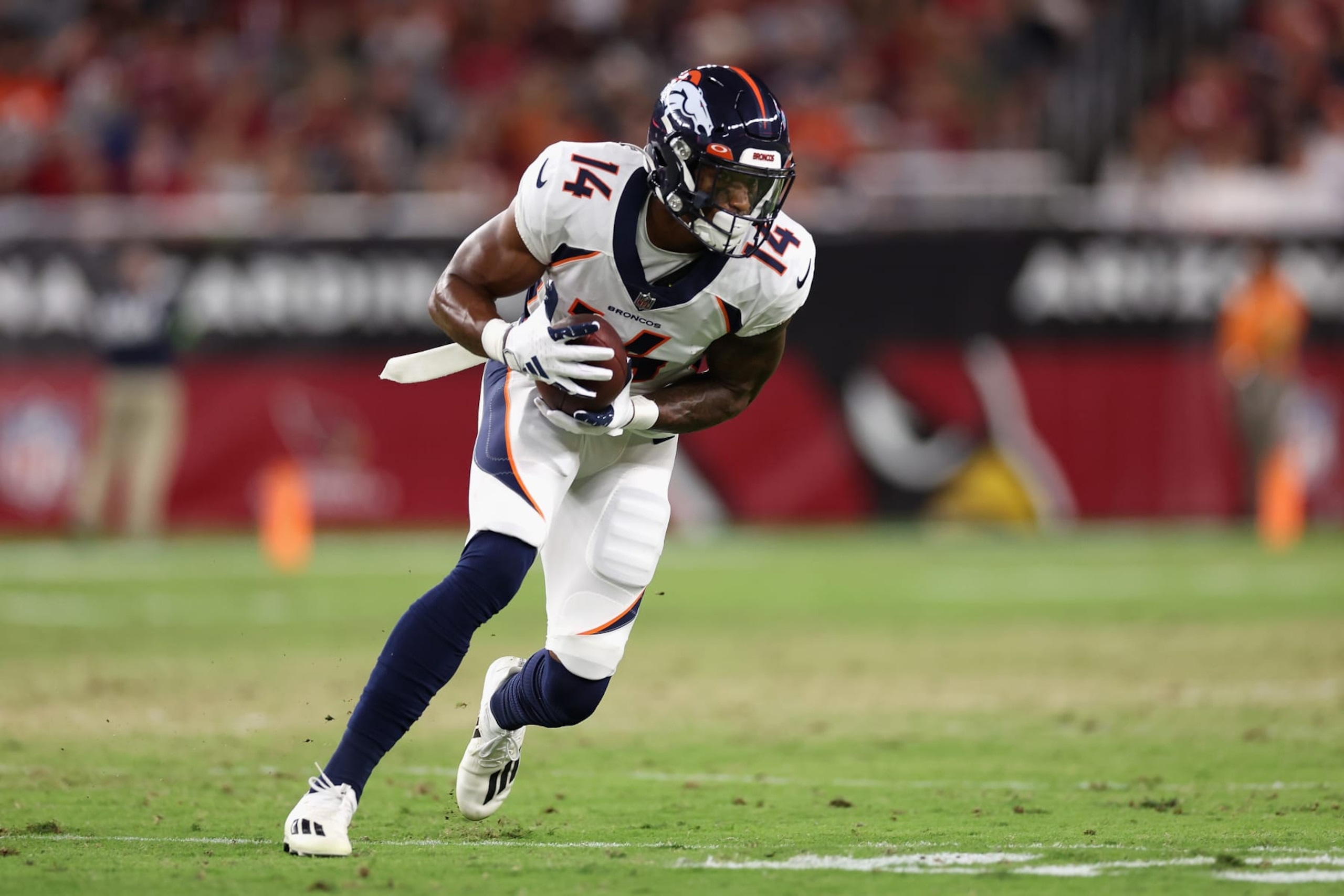 GLENDALE, ARIZONA - AUGUST 11: Wide receiver Courtland Sutton #14 of the Denver Broncos makes a reception against the Arizona Cardinals during the first half of the NFL game at State Farm Stadium on August 11, 2023 in Glendale, Arizona. The Cardinals defeated the Broncos 18-17. (Photo by Christian Petersen/Getty Images) GLENDALE, ARIZONA - AUGUST 11: Wide receiver Courtland Sutton #14 of the Denver Broncos makes a reception against the Arizona Cardinals during the first half of the NFL game at State Farm Stadium on August 11, 2023 in Glendale, Arizona. The Cardinals defeated the Broncos 18-17. (Photo by Christian Petersen/Getty Images)