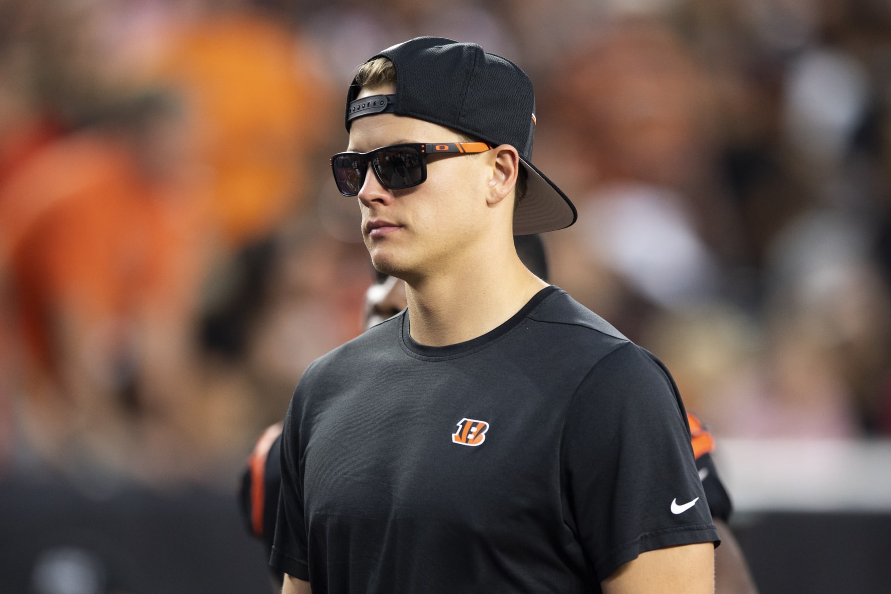 Cincinnati Bengals quarterback Joe Burrow (9) walks off the field for halftime during a preseason NFL football game against the Green Bay Packers on Friday, Aug. 11, 2023, in Cincinnati. (AP Photo/Emilee Chinn)