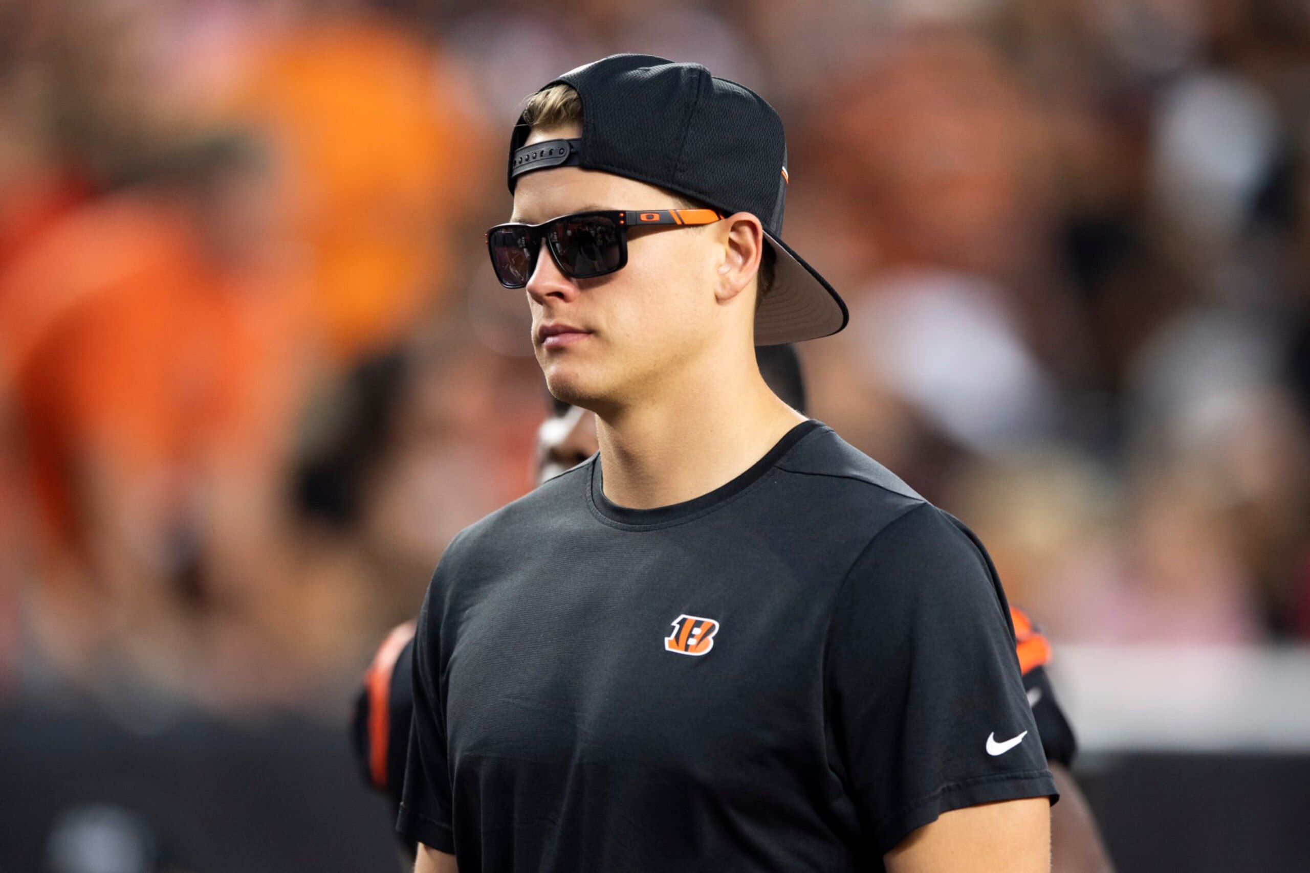 Cincinnati Bengals quarterback Joe Burrow (9) walks off the field for halftime during a preseason NFL football game against the Green Bay Packers on Friday, Aug. 11, 2023, in Cincinnati. (AP Photo/Emilee Chinn)