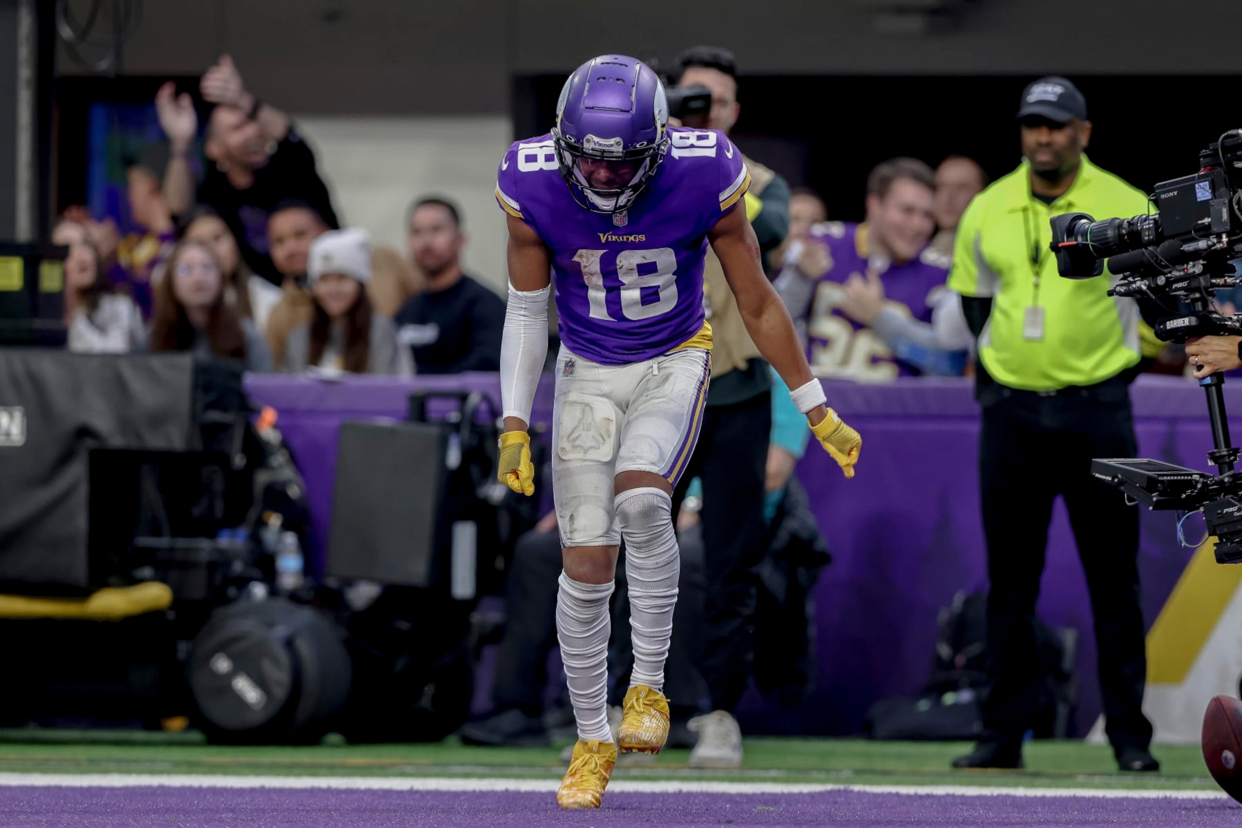 Minnesota Vikings wide receiver Justin Jefferson (18) celebrates in the end zone after scoring a touchdown against the Indianapolis Colts during the second half of an NFL football game Saturday, Dec. 17, 2022 in Minneapolis. (AP Photo/Stacy Bengs)