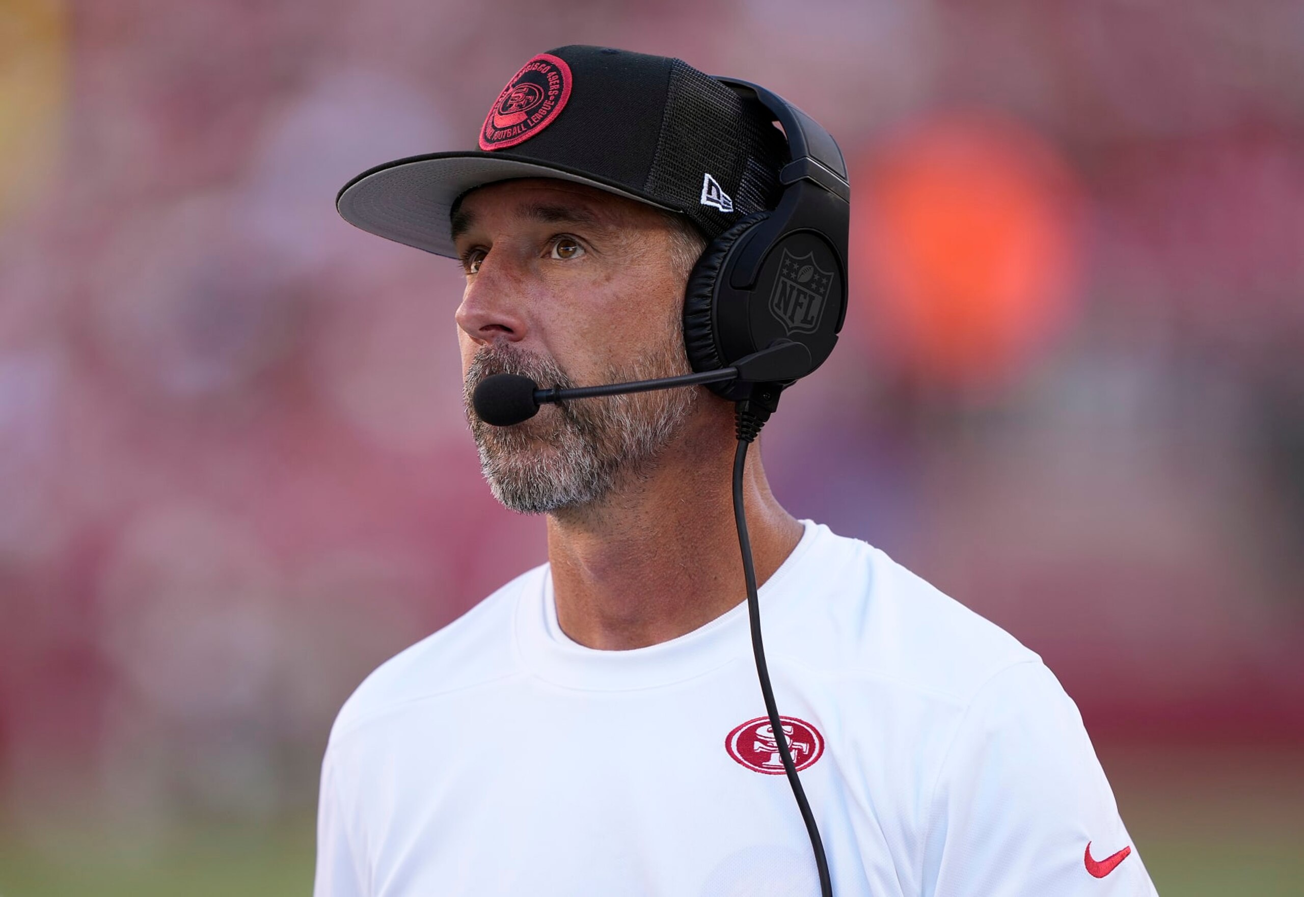 SANTA CLARA, CALIFORNIA - AUGUST 19: Head coach Kyle Shanahan of the San Francisco 49ers looks on from the sidelines against the Denver Broncos during the first quarter at Levi's Stadium on August 19, 2023 in Santa Clara, California. (Photo by Thearon W. Henderson/Getty Images)