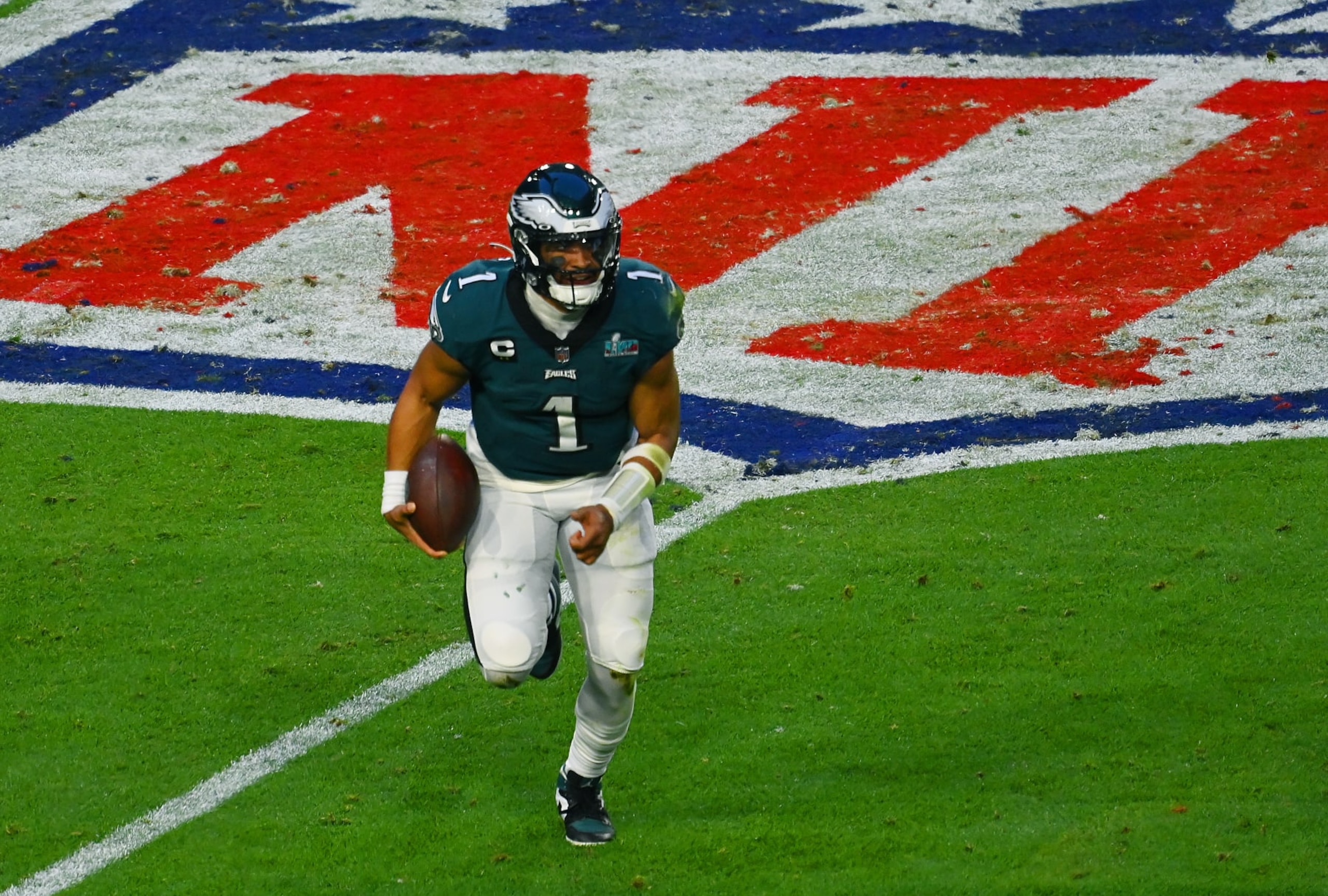 GLENDALE, ARIZONA - FEBRUARY 12: Jalen Hurts #1 of the Philadelphia Eagles runs with the ball against the Kansas City Chiefs during the first half in Super Bowl LVII at State Farm Stadium on February 12, 2023 in Glendale, Arizona. (Photo by Focus on Sport/Getty Images)