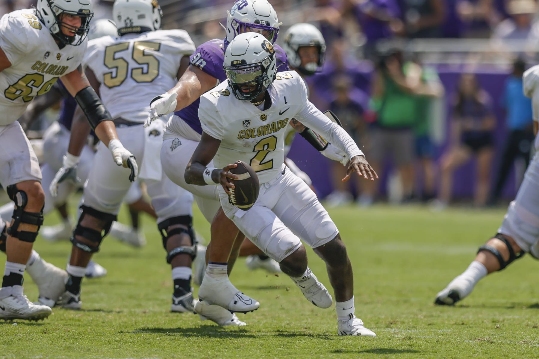 FORT WORTH, TX - SEPTEMBER 02: Colorado Buffaloes quarterback Shedeur Sanders (2) scrambles out of the pocket during the game between the TCU Horned Frogs and the Colorado Buffaloes on September 2, 2023 at Amon G. Carter Stadium in Fort Worth, Texas. (Photo by Matthew Pearce/Icon Sportswire via Getty Images)