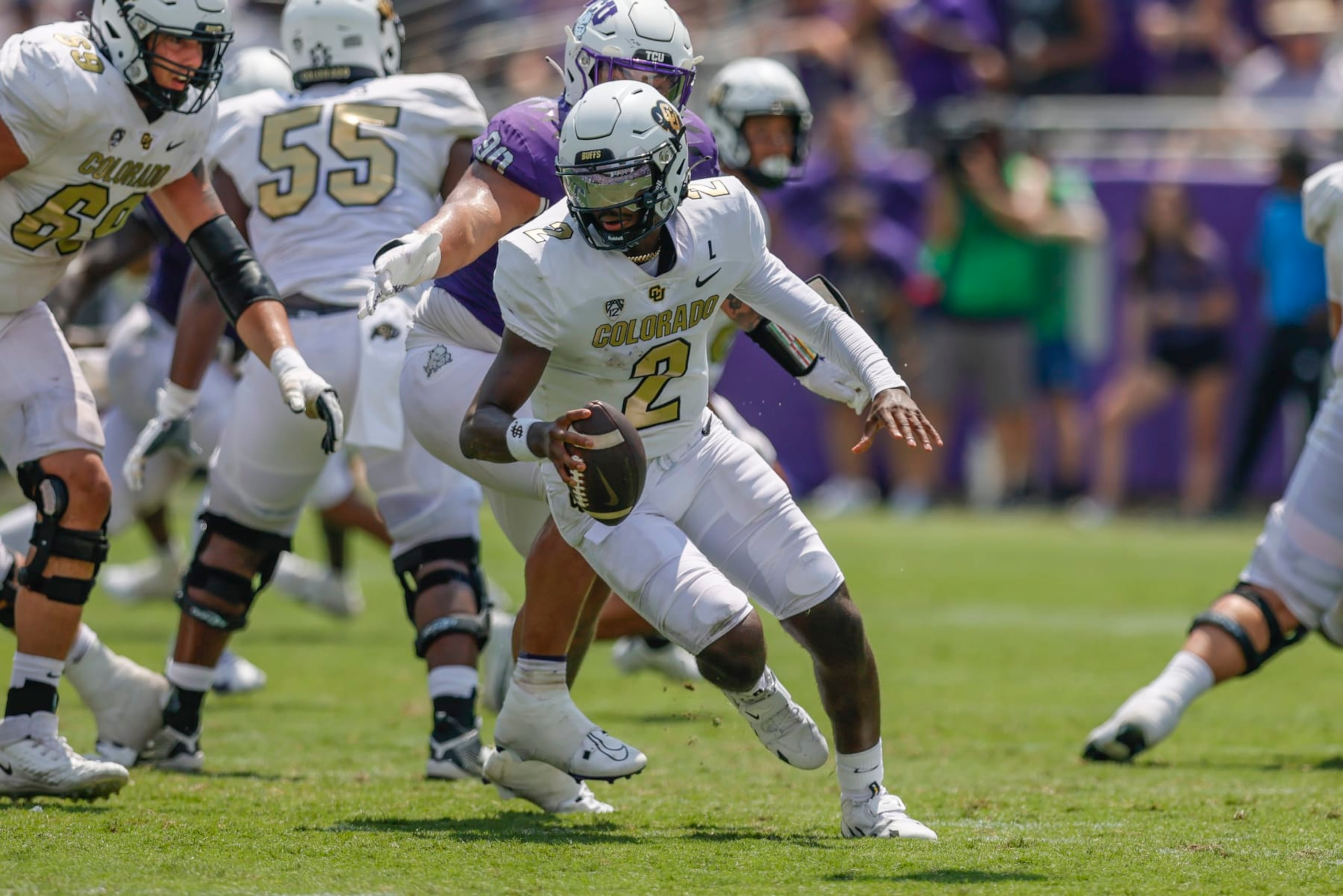 FORT WORTH, TX - SEPTEMBER 02: Colorado Buffaloes quarterback Shedeur Sanders (2) scrambles out of the pocket during the game between the TCU Horned Frogs and the Colorado Buffaloes on September 2, 2023 at Amon G. Carter Stadium in Fort Worth, Texas. (Photo by Matthew Pearce/Icon Sportswire via Getty Images)