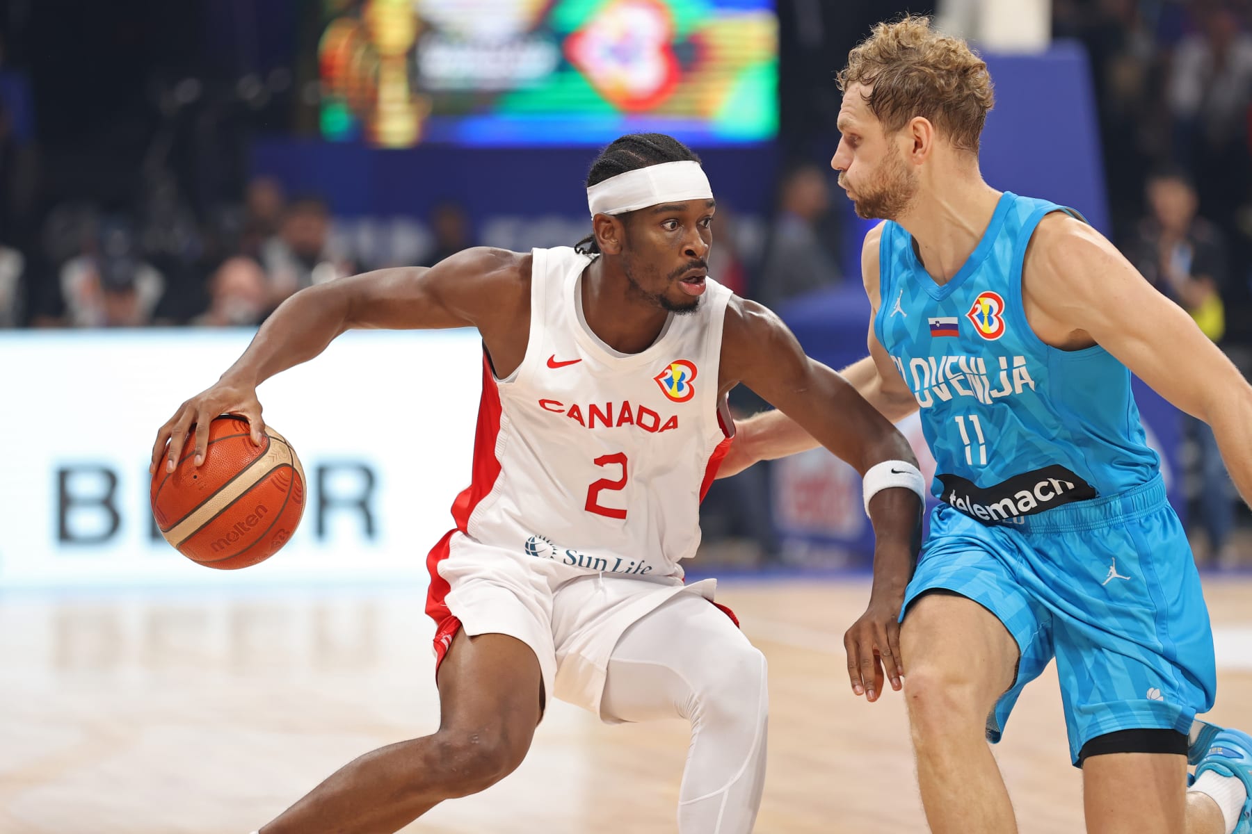 MANILA, PHILIPPINES - SEPTEMBER 6: Shai Gilgeous-Alexander of Canada dribbles the ball against Slovenia as part of the 2023 FIBA World Cup on September 6, 2023 at Mall of Asia Arena in Manila, Philippines. NOTE TO USER: User expressly acknowledges and agrees that, by downloading and/or using this photograph, user is consenting to the terms and conditions of the Getty Images License Agreement. Mandatory Copyright Notice: Copyright 2023 NBAE (Photo by Stephen Gosling/NBAE via Getty Images)