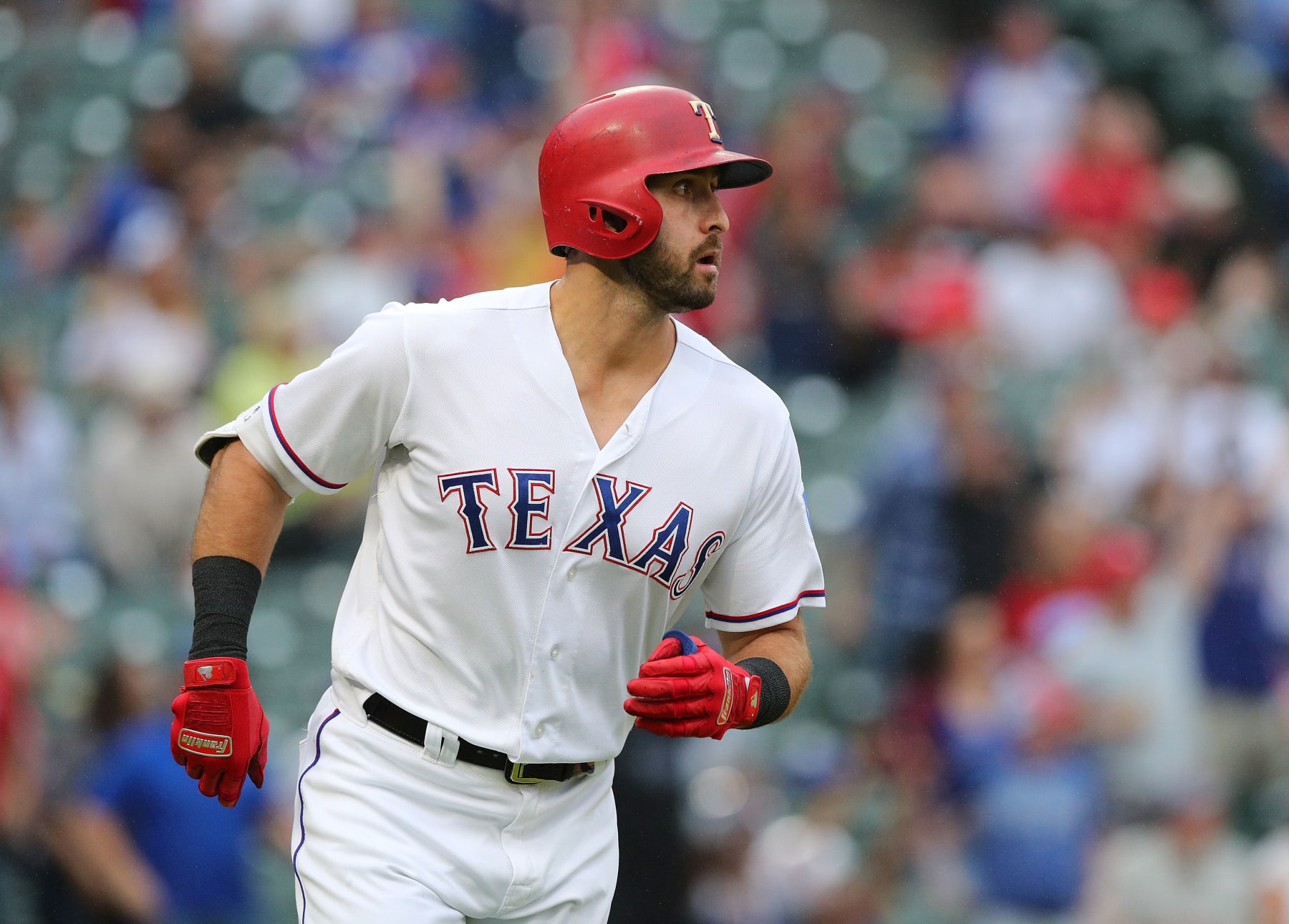 ARLINGTON, TX - SEPTEMBER 23: Joey Gallo #13 of the Texas Rangers watches his solo home run shot in the eighth inning of a game against the Seattle Mariners at Globe Life Park in Arlington on September 23, 2018 in Arlington, Texas.  (Photo by Richard Rodriguez/Getty Images)