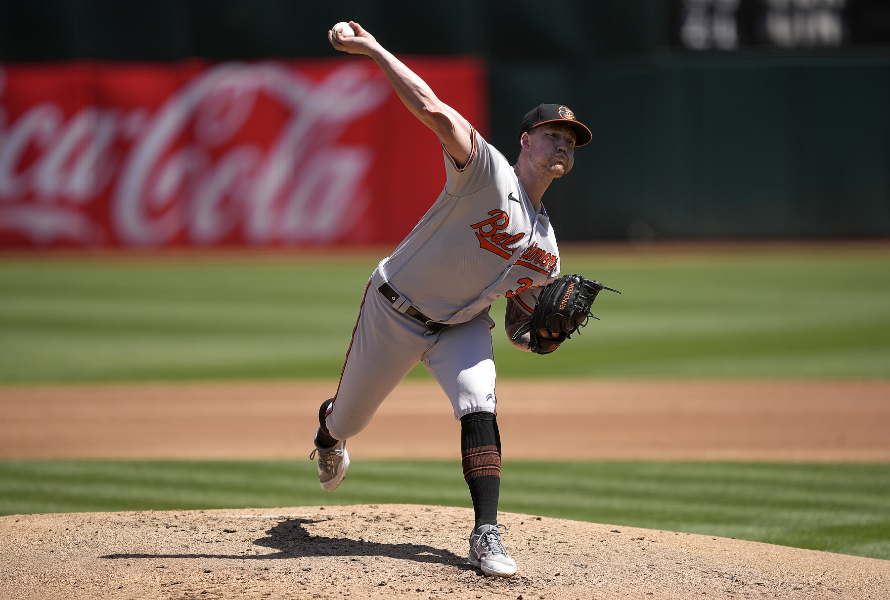 OAKLAND, CALIFORNIA - AUGUST 20: Kyle Bradish #39 of the Baltimore Orioles pitches against the Oakland Athletics in the bottom of the first inning at RingCentral Coliseum on August 20, 2023 in Oakland, California. (Photo by Thearon W. Henderson/Getty Images)