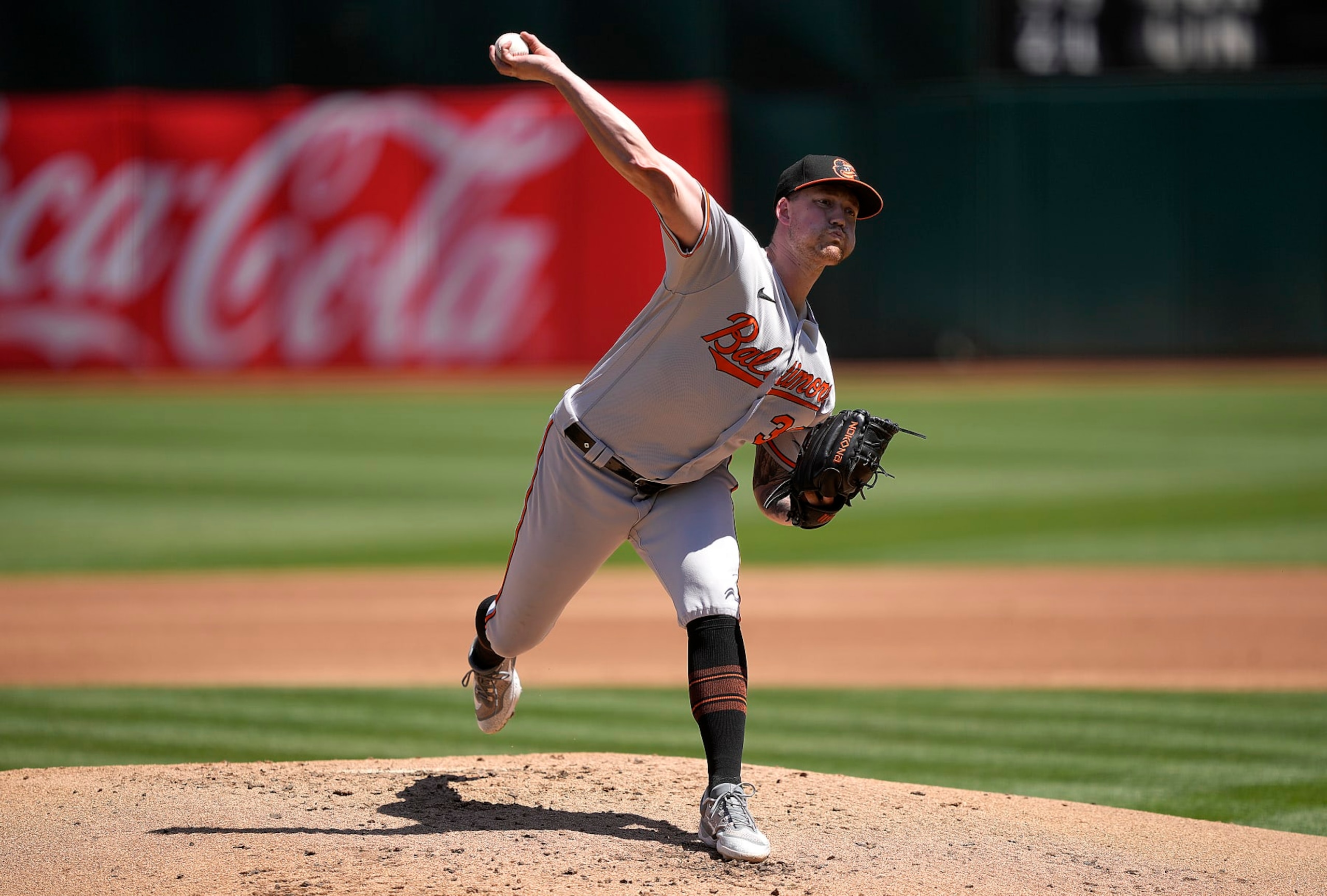 OAKLAND, CALIFORNIA - AUGUST 20: Kyle Bradish #39 of the Baltimore Orioles pitches against the Oakland Athletics in the bottom of the first inning at RingCentral Coliseum on August 20, 2023 in Oakland, California. (Photo by Thearon W. Henderson/Getty Images)