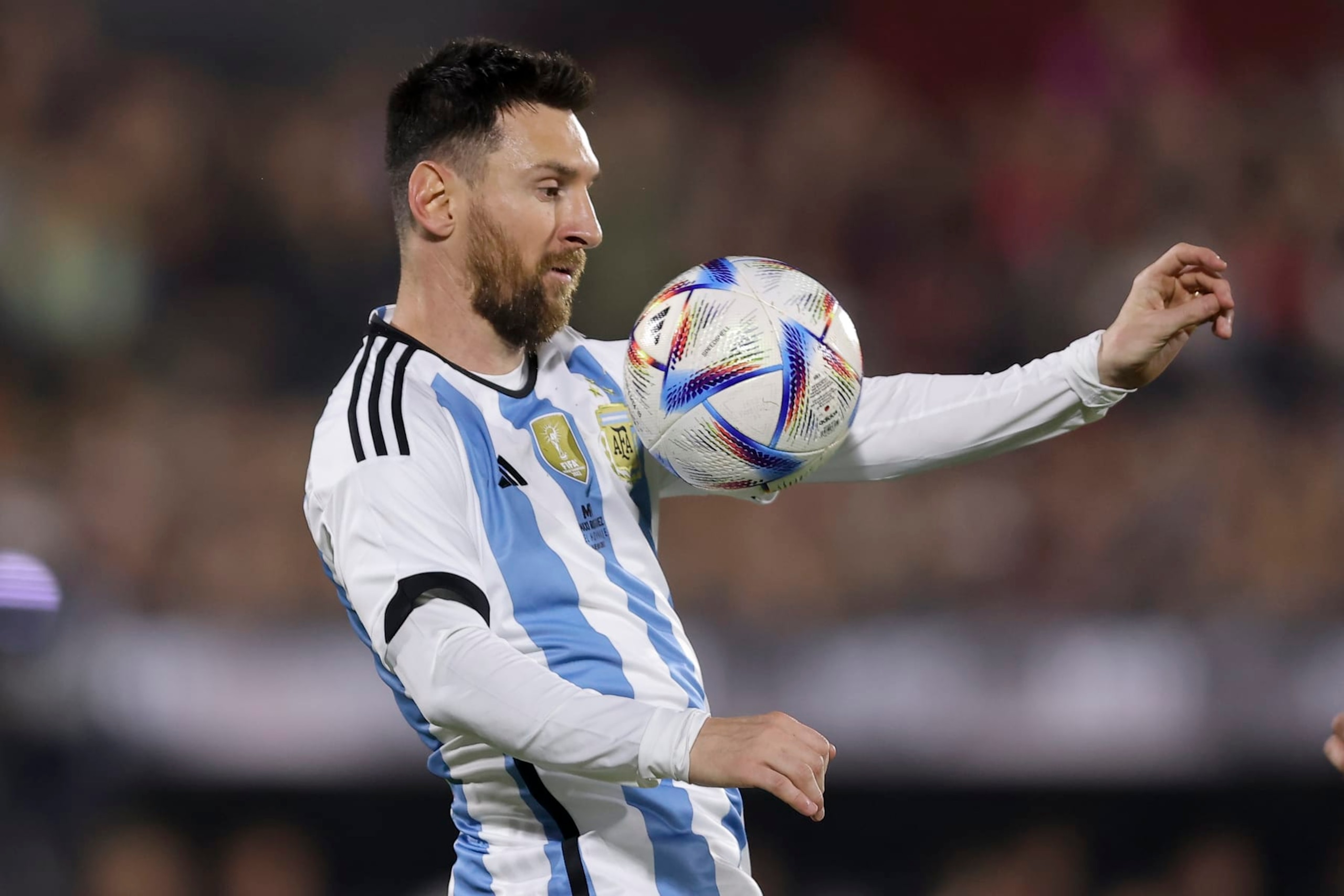 Lionel Messi controls the ball during Argentine soccer player Maximiliano Rodriguez's farewell match at the Marcelo Bielsa stadium in Rosario, Argentina, Saturday, June 24, 2023.(AP Photo/Nicolas Aguilera)