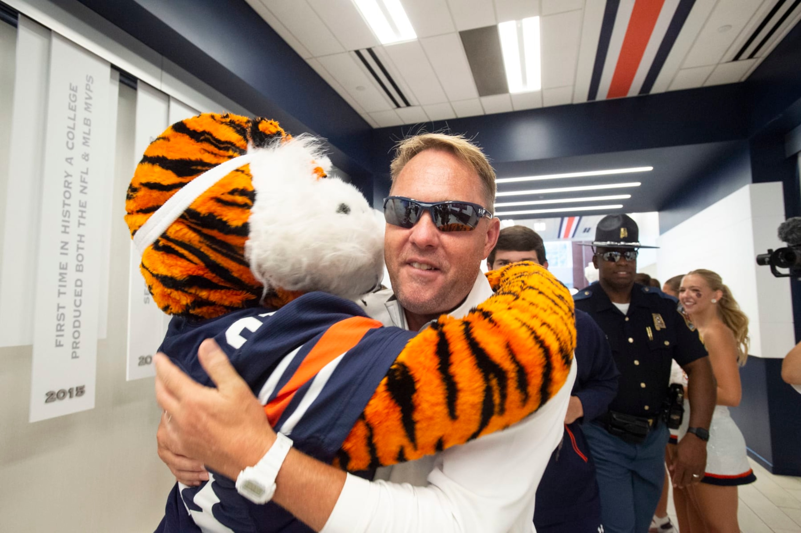 AUBURN, ALABAMA - SEPTEMBER 02: Head coach Hugh Freeze of the Auburn Tigers hugs mascot Aubie of the Auburn Tigers prior to their game against the Massachusetts Minutemen at Jordan-Hare Stadium on September 02, 2023 in Auburn, Alabama. (Photo by Michael Chang/Getty Images) AUBURN, ALABAMA - SEPTEMBER 02: Head coach Hugh Freeze of the Auburn Tigers hugs mascot Aubie of the Auburn Tigers prior to their game against the Massachusetts Minutemen at Jordan-Hare Stadium on September 02, 2023 in Auburn, Alabama. (Photo by Michael Chang/Getty Images)