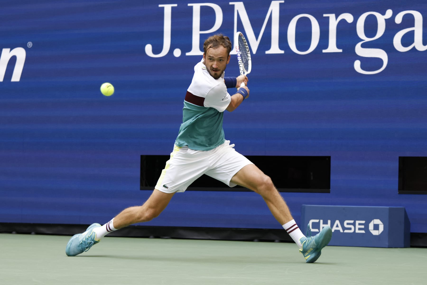 Russia's Daniil Medvedev hits a return to Russia's Andrey Rublev during the US Open tennis tournament men's singles quarter-finals match at the USTA Billie Jean King National Tennis Center in New York City, on September 6, 2023. (Photo by KENA BETANCUR / AFP) (Photo by KENA BETANCUR/AFP via Getty Images)