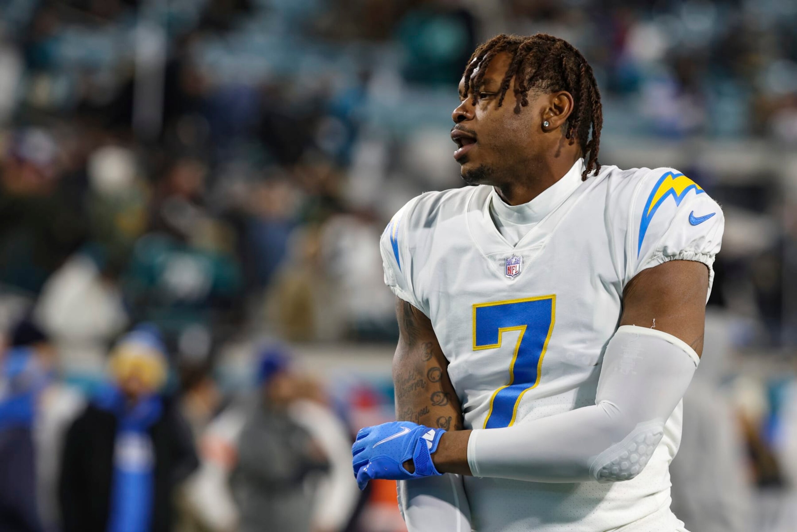 Los Angeles Chargers tight end Gerald Everett (7) warms up before an NFL wild-card football game against the Jacksonville Jaguars, Saturday, Jan. 14, 2023, in Jacksonville, Fla. The Jaguars defeated the Chargers 31-30. (AP Photo/Gary McCullough)