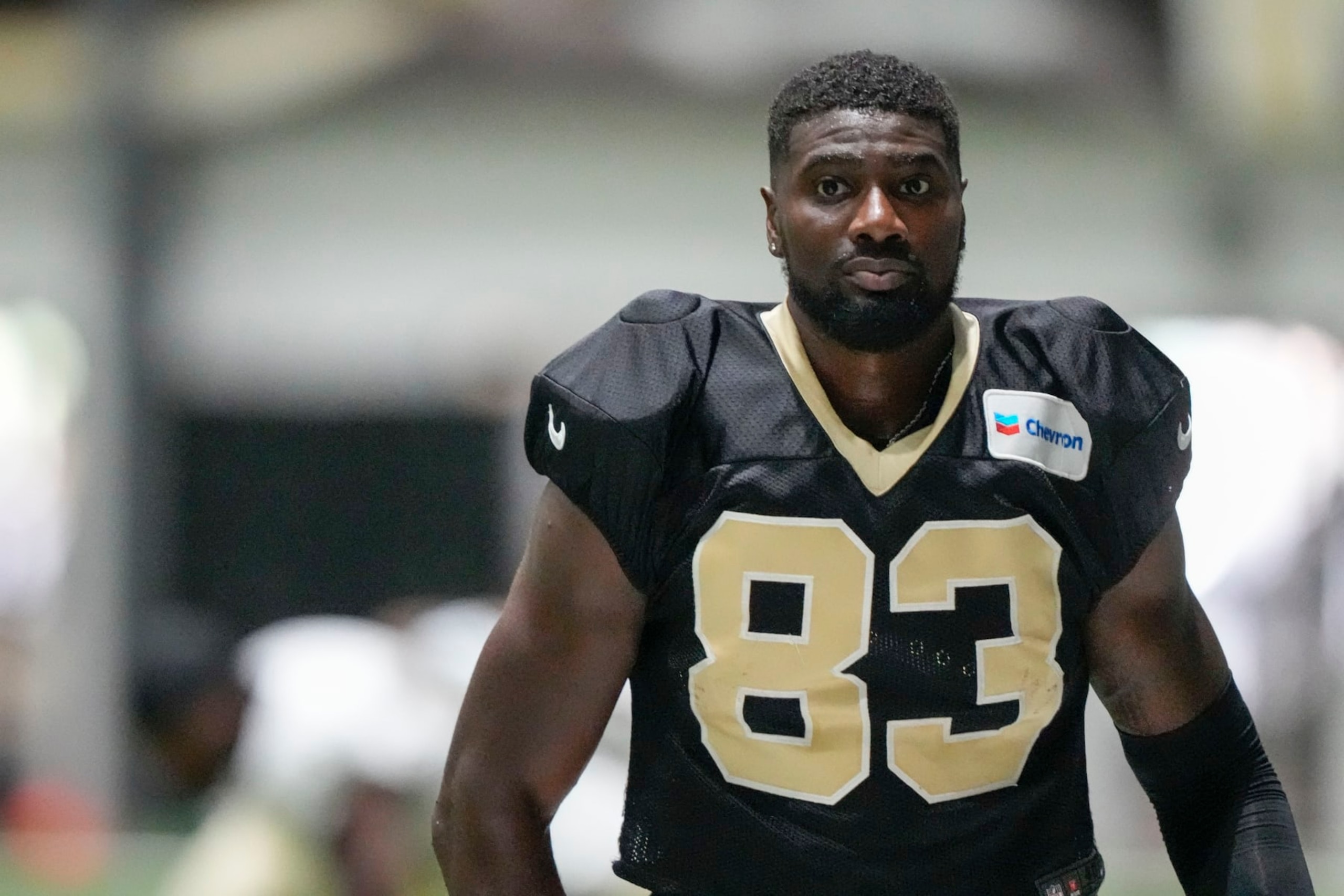 New Orleans Saints tight end Juwan Johnson (83) runs through drills at the NFL team's football training camp in Metairie, La., Wednesday, Aug. 2, 2023. (AP Photo/Gerald Herbert)