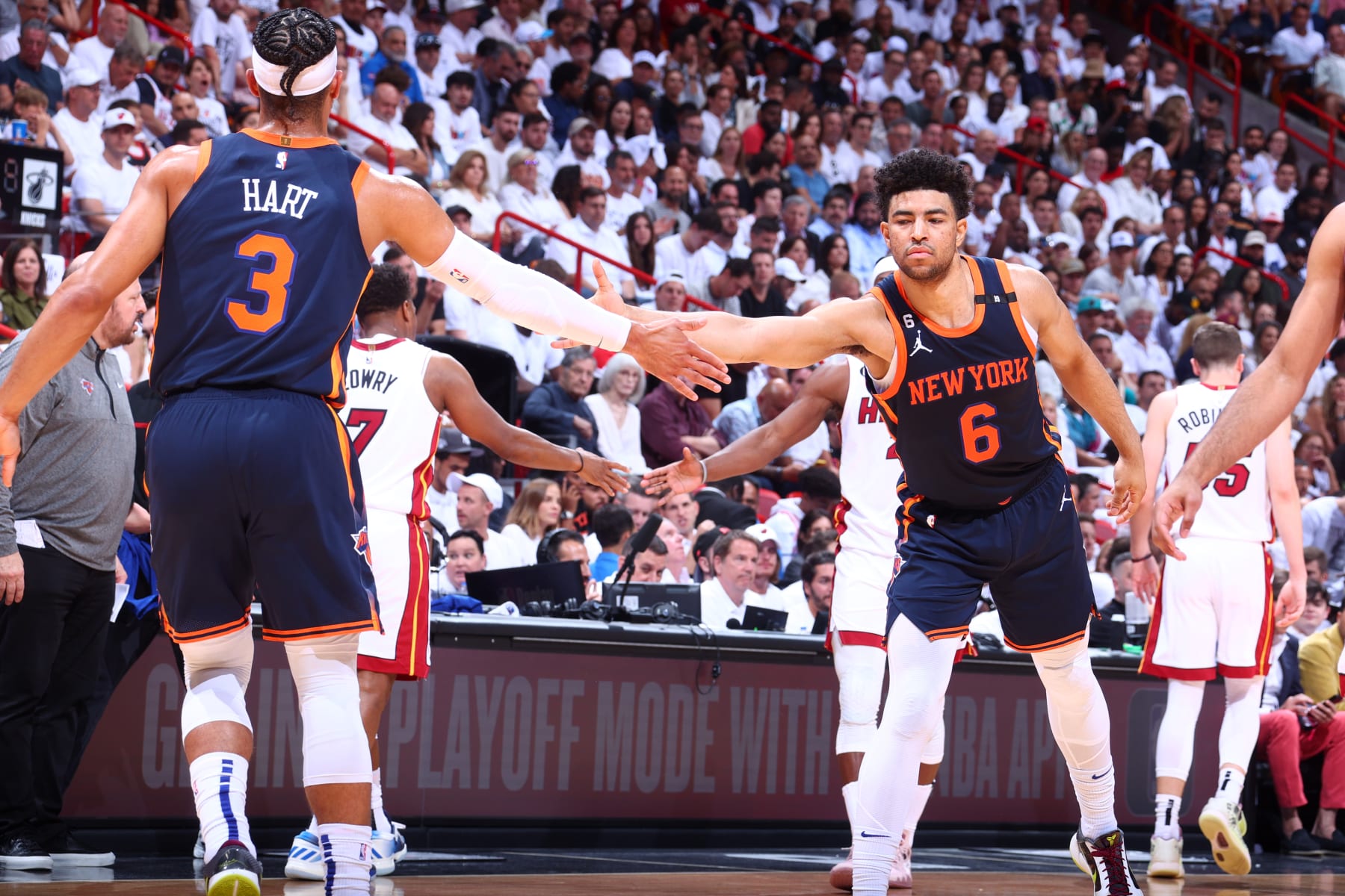 MIAMI, FL - MAY 12: Quentin Grimes #6 of the New York Knicks high fives Josh Hart #3 of the New York Knicks during the game against the Miami Heat during Game 6 of the 2023 NBA Playoffs Eastern Conference semi-finals on May 12, 2023 at Kaseya Center in Miami, Florida. NOTE TO USER: User expressly acknowledges and agrees that, by downloading and or using this Photograph, user is consenting to the terms and conditions of the Getty Images License Agreement. Mandatory Copyright Notice: Copyright 2023 NBAE (Photo by Nathaniel S. Butler/NBAE via Getty Images)