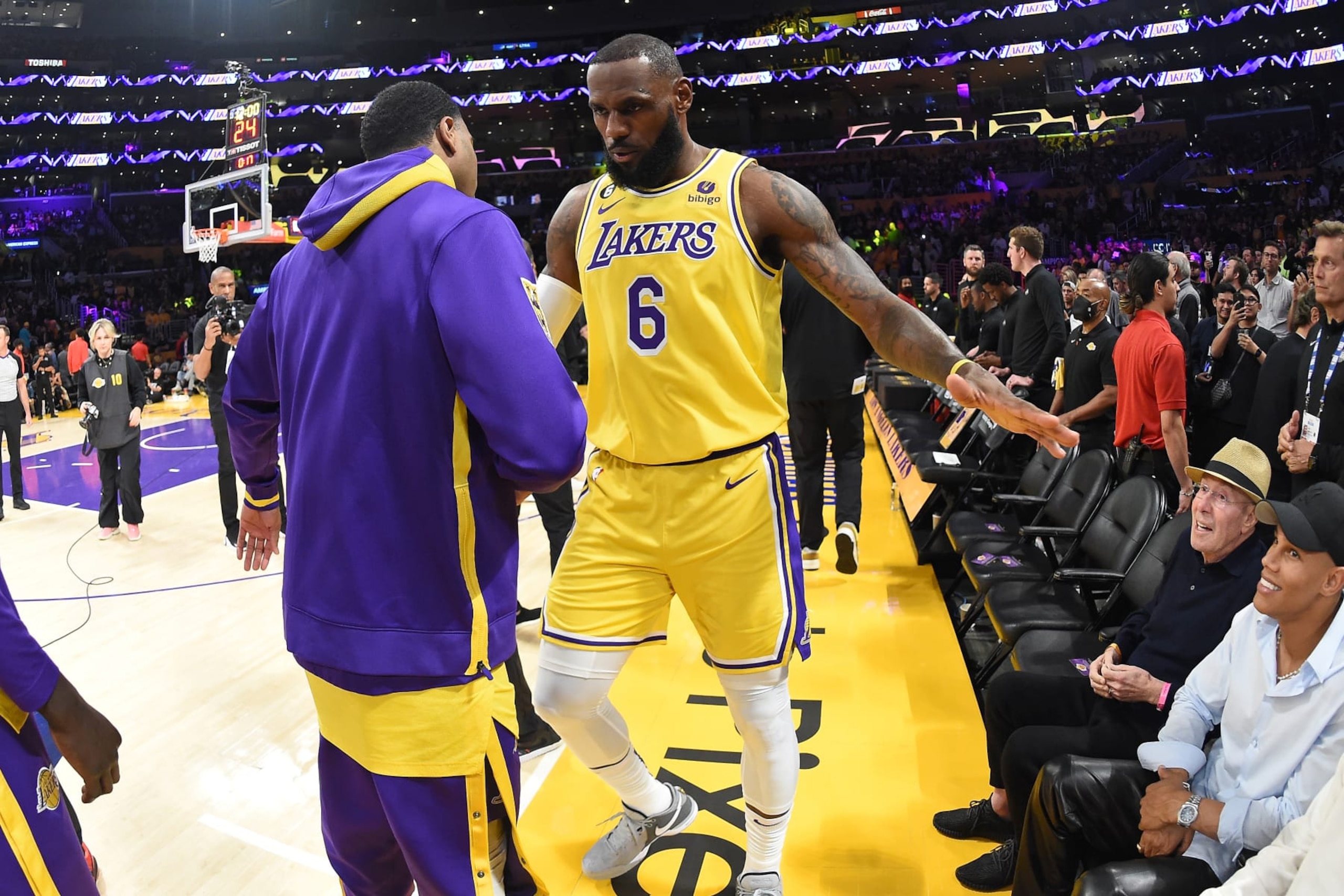 LOS ANGELES, CA - MAY 22: LeBron James #6 embraces Lonnie Walker IV #4 of the Los Angeles Lakers before round 2 game 4 of the Western Conference finals against the Denver Nuggets on May 22, 2023 at Crypto.Com Arena in Los Angeles, California. NOTE TO USER: User expressly acknowledges and agrees that, by downloading and/or using this Photograph, user is consenting to the terms and conditions of the Getty Images License Agreement. Mandatory Copyright Notice: Copyright 2023 NBAE (Photo by Andrew D. Bernstein/NBAE via Getty Images)