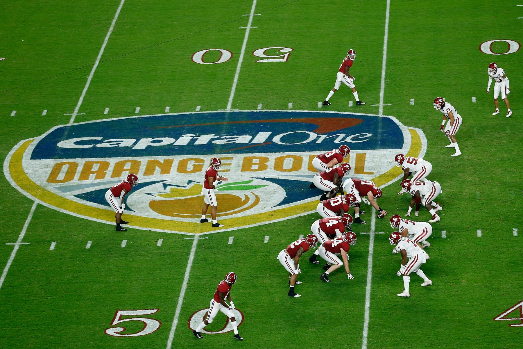 MIAMI, FL - DECEMBER 29:  Tua Tagovailoa #13 of the Alabama Crimson Tide snaps the ball against the Oklahoma Sooners during the College Football Playoff Semifinal at the Capital One Orange Bowl at Hard Rock Stadium on December 29, 2018 in Miami, Florida.  (Photo by Michael Reaves/Getty Images)