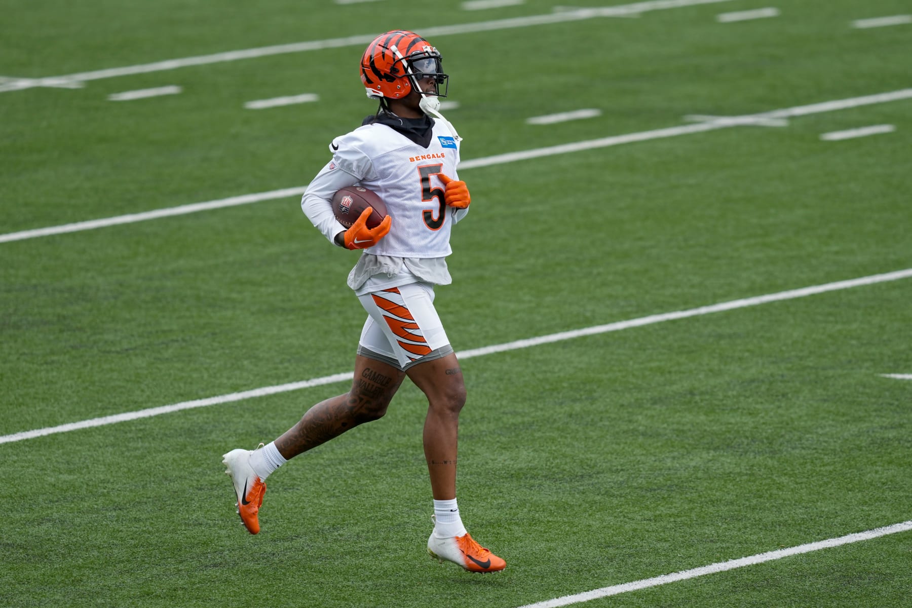 CINCINNATI, OHIO - JUNE 13: Tee Higgins #5 of the Cincinnati Bengals participates in a drill during an offseason workout on June 13, 2023 in Cincinnati, Ohio. (Photo by Dylan Buell/Getty Images)