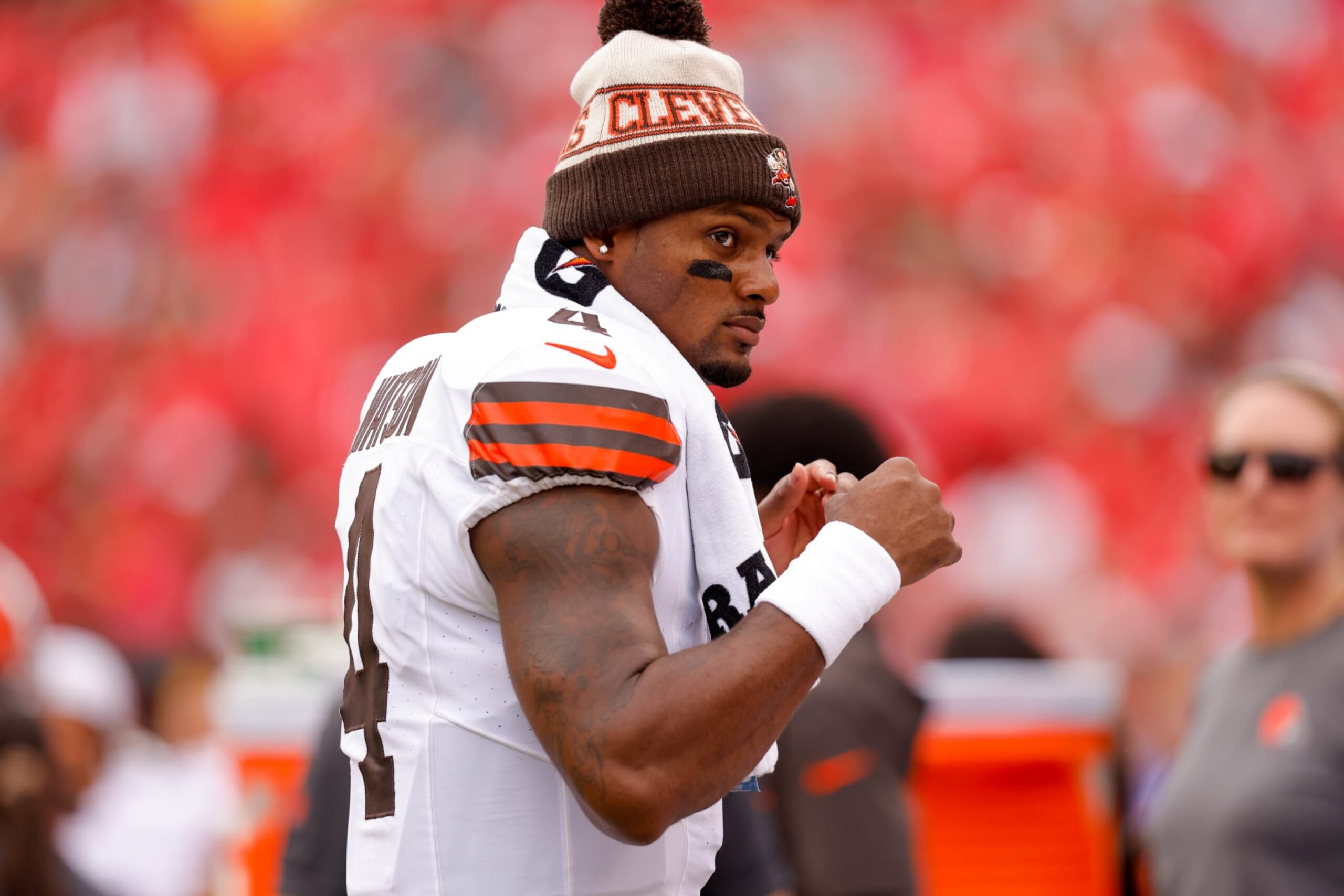 KANSAS CITY, MISSOURI - AUGUST 26: Deshaun Watson #4 of the Cleveland Browns stands on the sidelines during the first quarter of a preseason game against the Kansas City Chiefs at GEHA Field at Arrowhead Stadium on August 26, 2023 in Kansas City, Missouri. (Photo by David Eulitt/Getty Images)