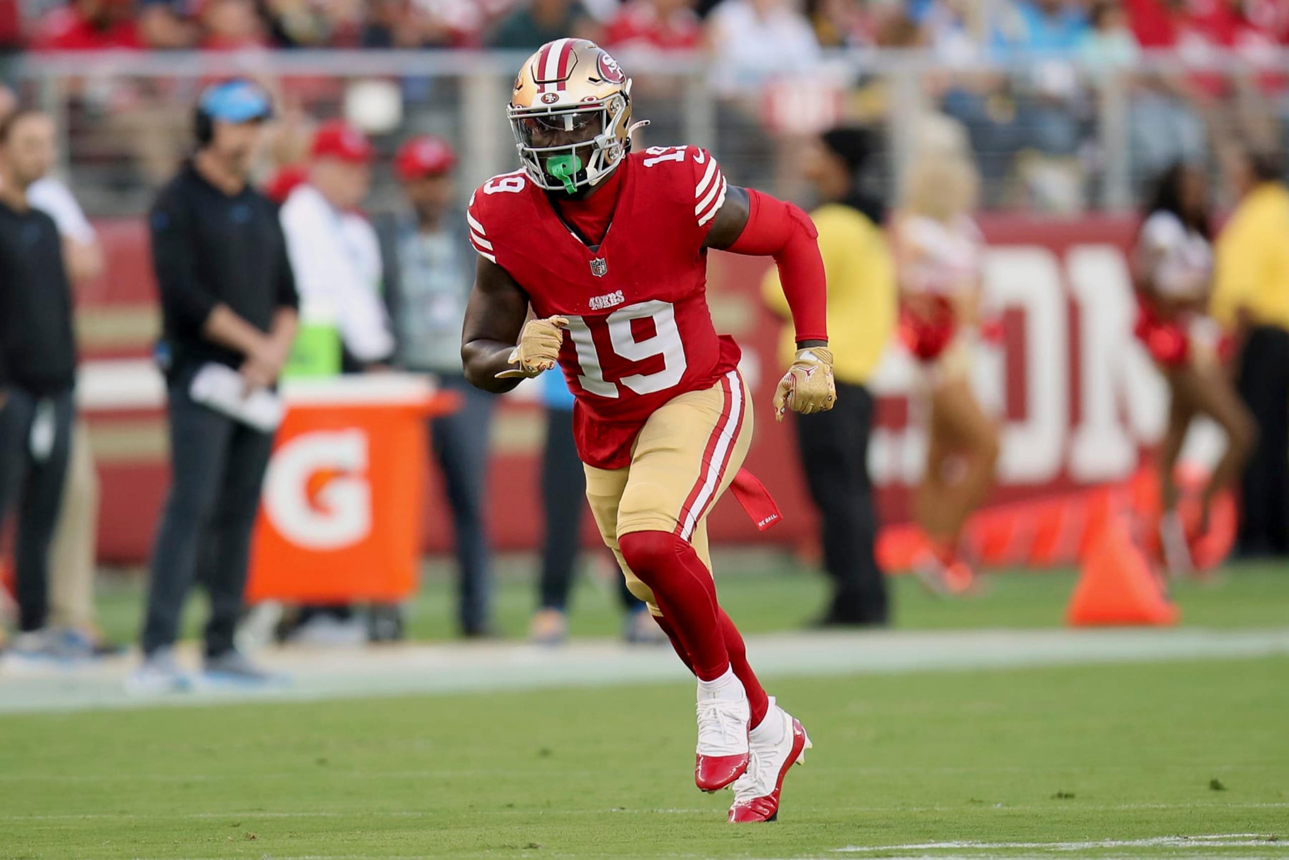 San Francisco 49ers wide receiver Deebo Samuel (19) runs during an NFL football game against the Los Angeles Chargers, Friday, Aug. 25, 2023, in Santa Clara, Calif. (AP Photo/Scot Tucker)
