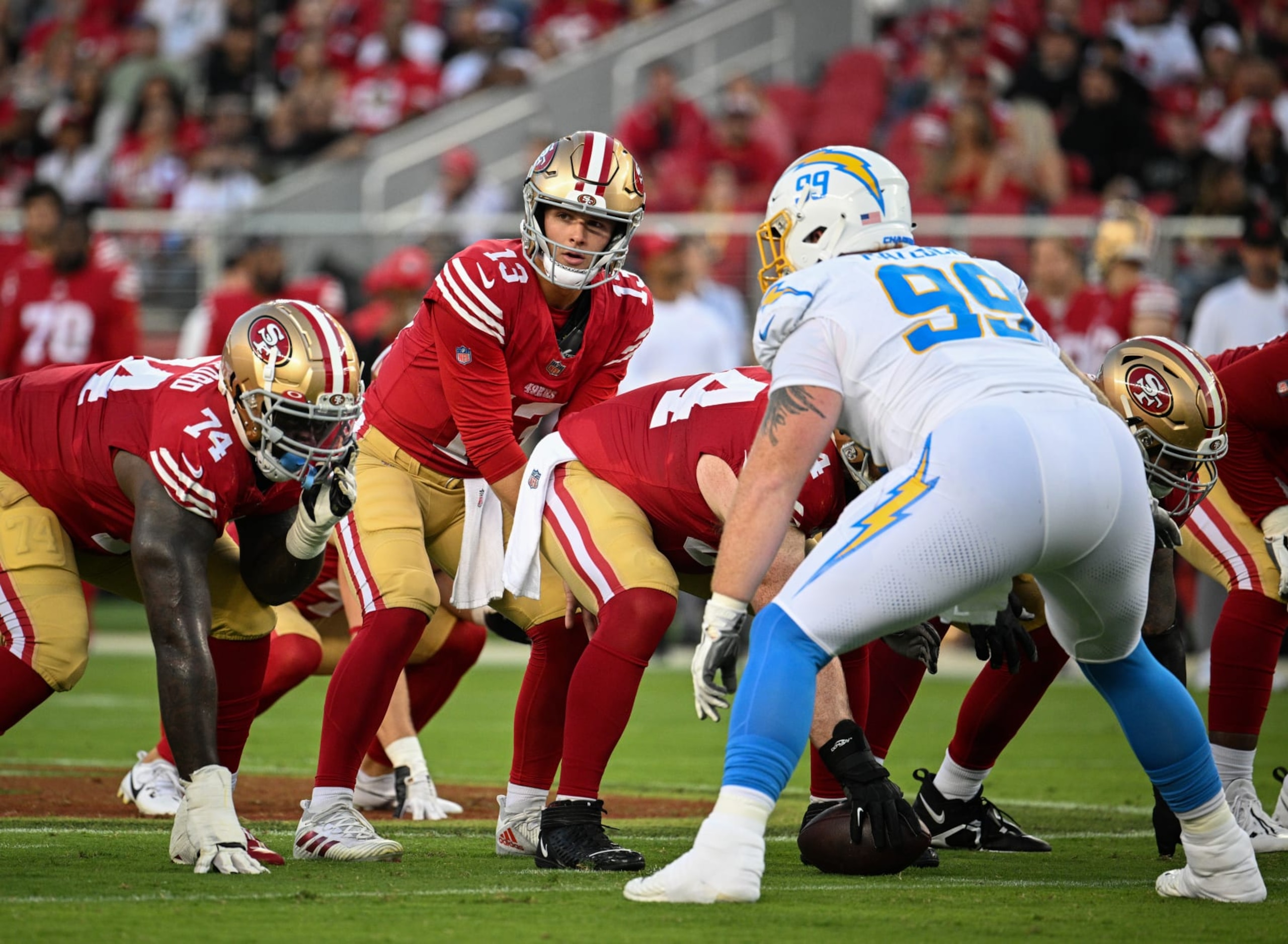 SANTA CLARA, CALIFORNIA - AUGUST 25: Brock Purdy #13 of the San Francisco 49ers stands behind center before a snap during the first half of a preseason game against the Los Angeles Chargers at Levi's Stadium on August 25, 2023 in Santa Clara, California. (Photo by Loren Elliott/Getty Images)